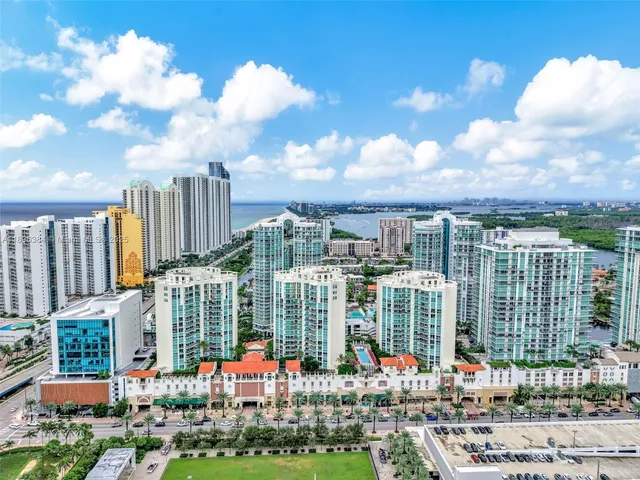 a view of a city and tall buildings
