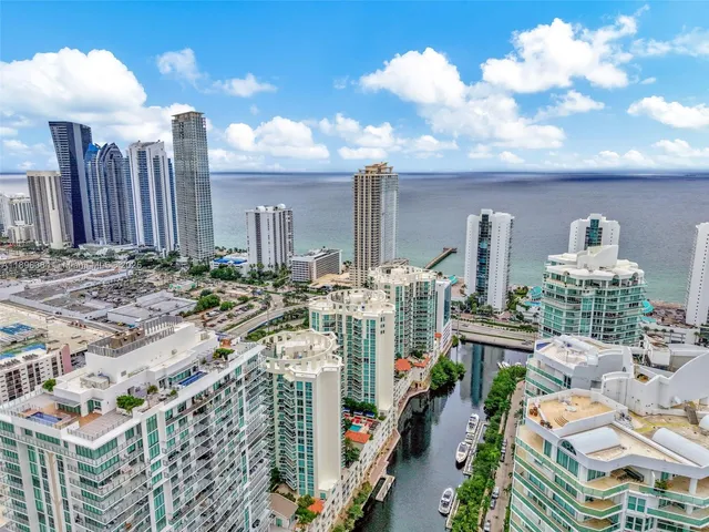 a view of a city with tall buildings