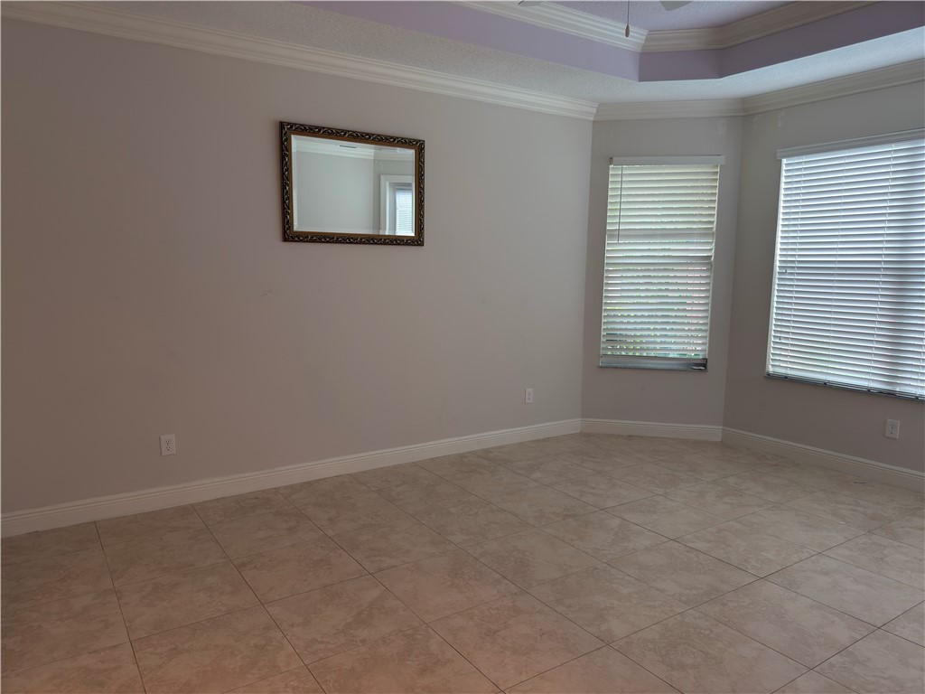 4253 Diamond Square Vero Beach, FL 32967 - Photo 13 of 22 an empty room with a window