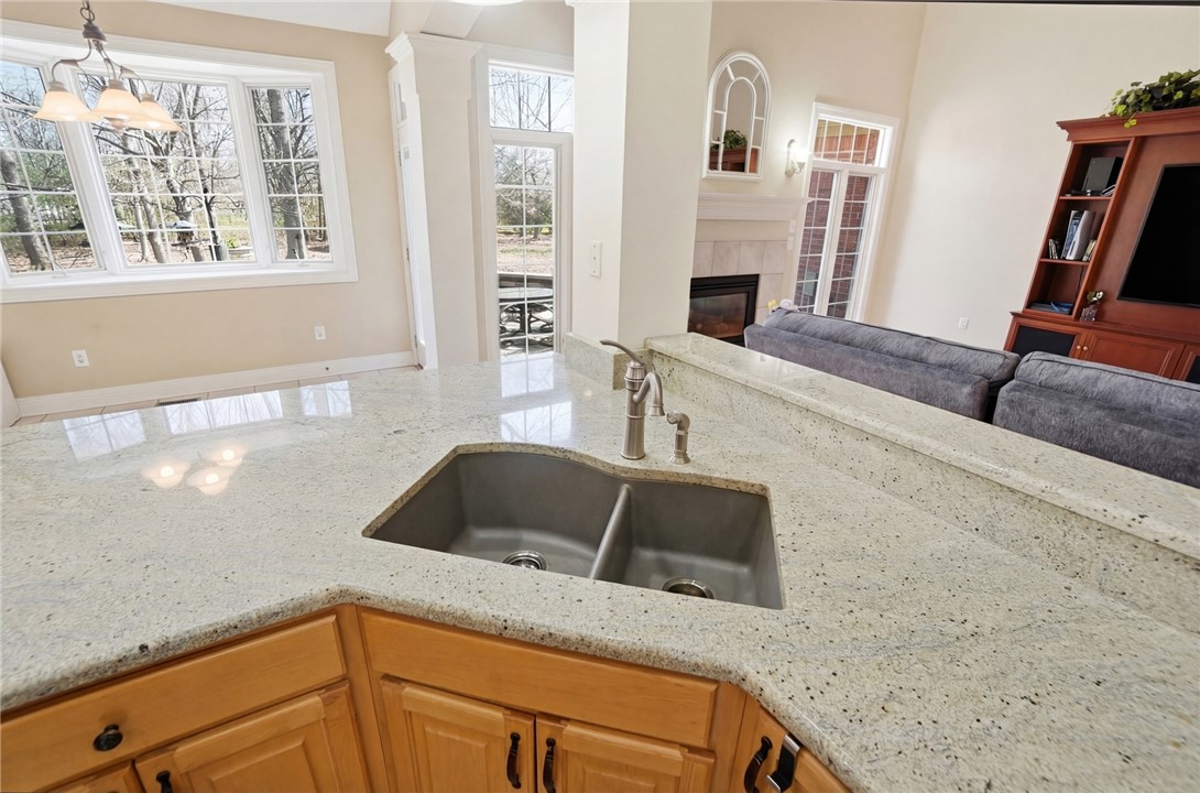 472 Timber Walk Court Springboro, OH 45066 - Photo 12 of 86 This spacious kitchen offers ample countertop space and a view into the living area.