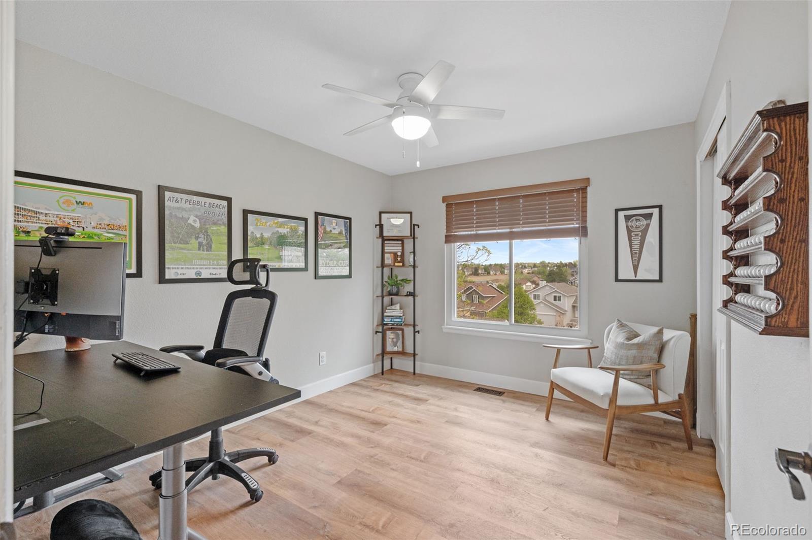 9272 South Crestmore Way Highlands Ranch, CO 80126 - Photo 23 of 46 a room with gym equipment and windows