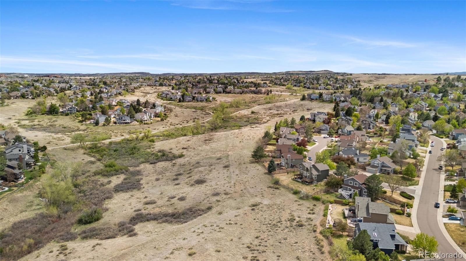 9272 South Crestmore Way Highlands Ranch, CO 80126 - Photo 39 of 46 an aerial view of a city
