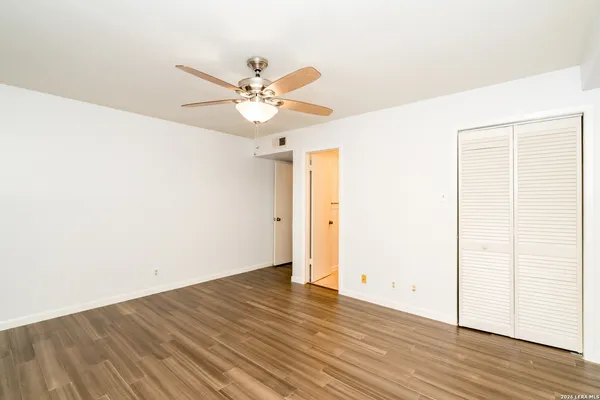 a bathroom with a sink mirror toilet and bathtub
