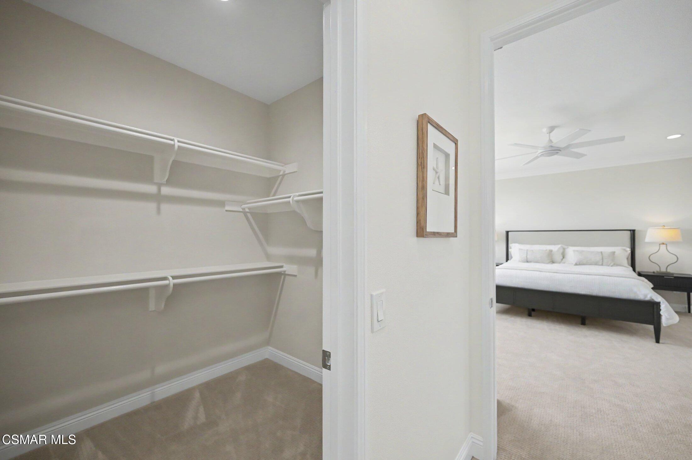 20800 Sardinia Way Porter Ranch, CA 91326 - Photo 29 of 57 a view of a hallway with closet