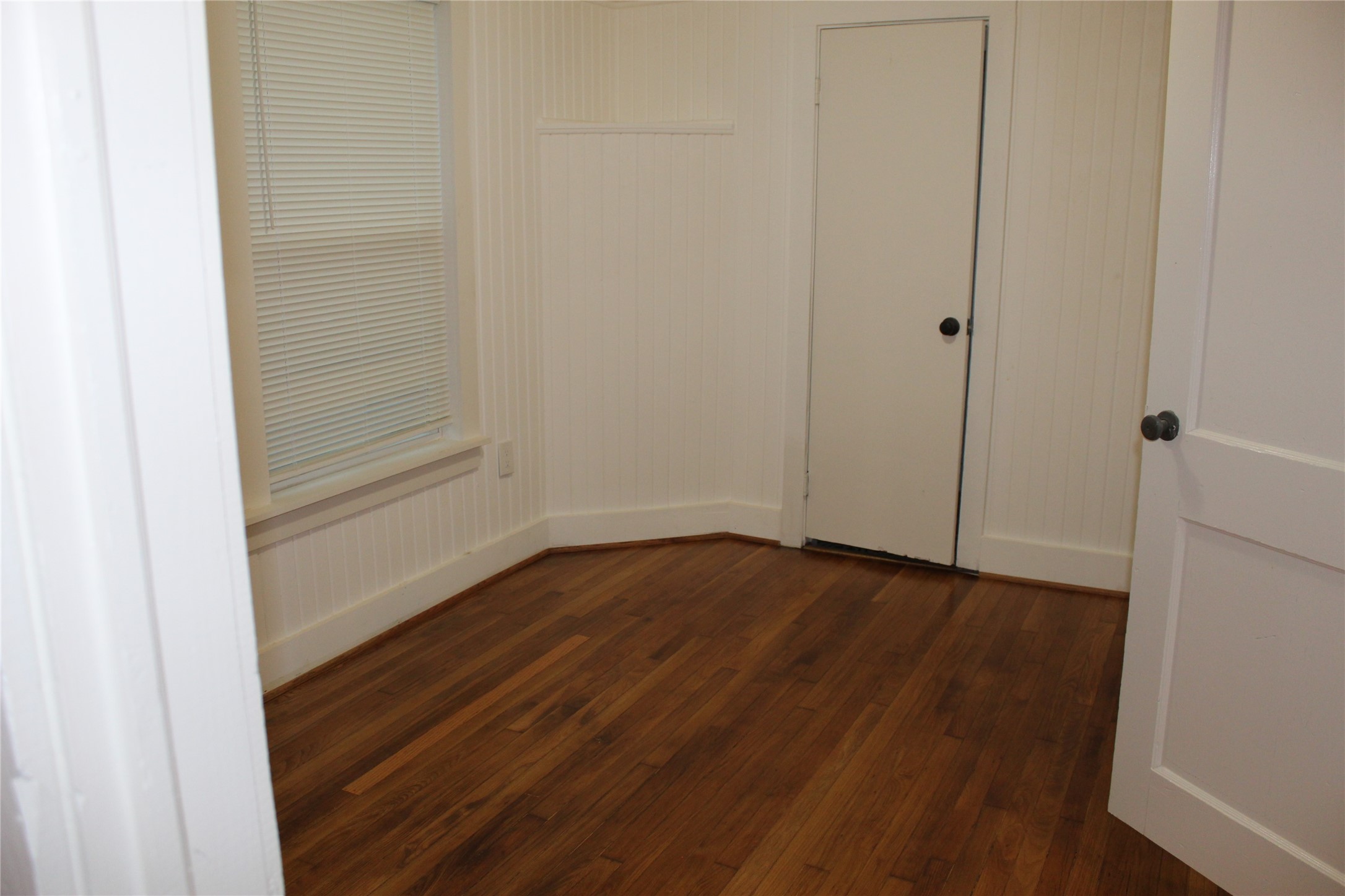 2713 Cochran Street Houston, TX 77009 - Photo 11 of 28 a view of an empty room with wooden floor and closet