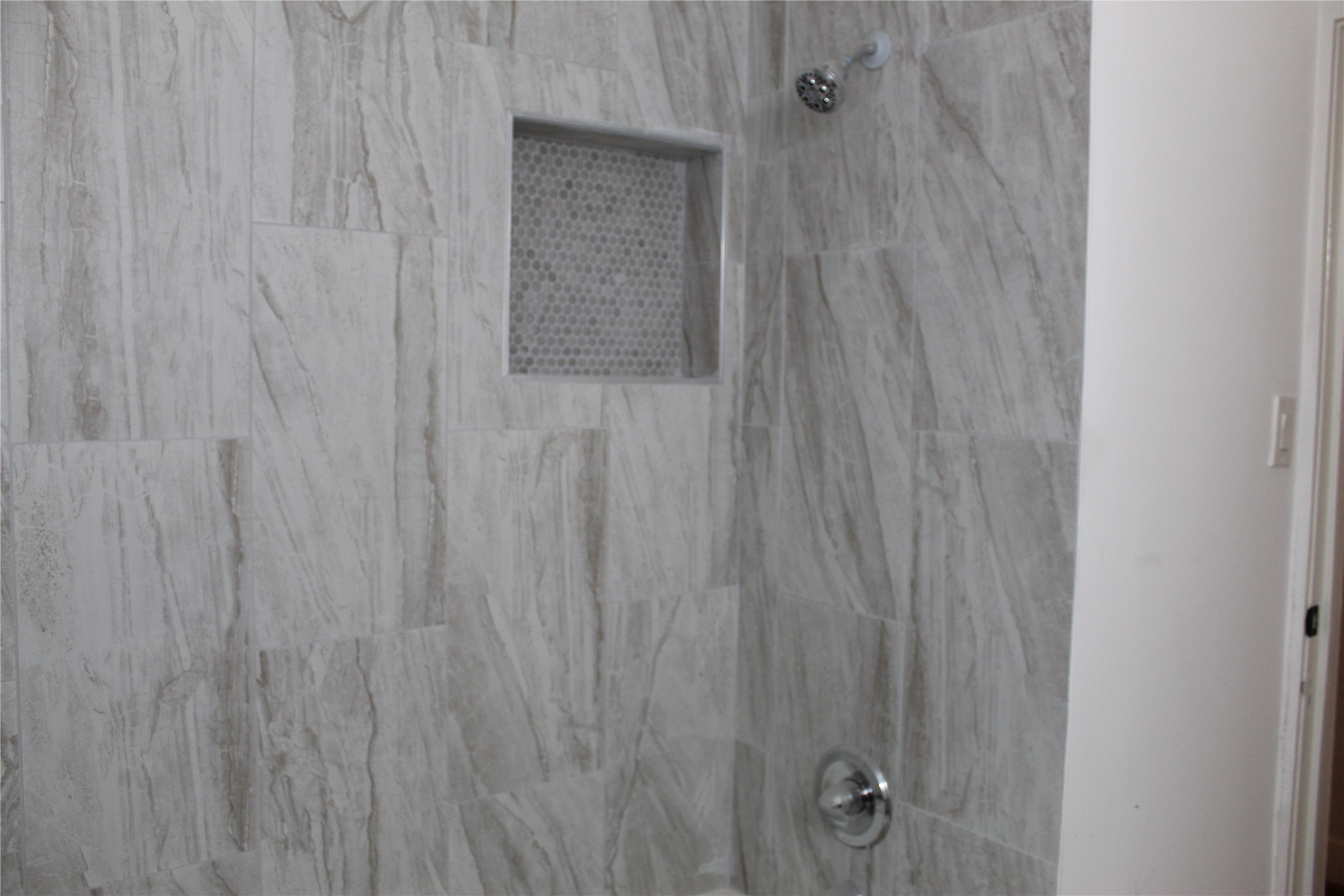 2713 Cochran Street Houston, TX 77009 - Photo 16 of 28 a bathroom with a shower