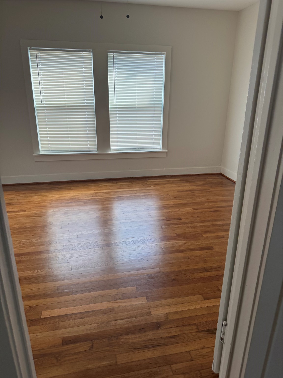 2713 Cochran Street Houston, TX 77009 - Photo 26 of 28 a view of empty room with wooden floor