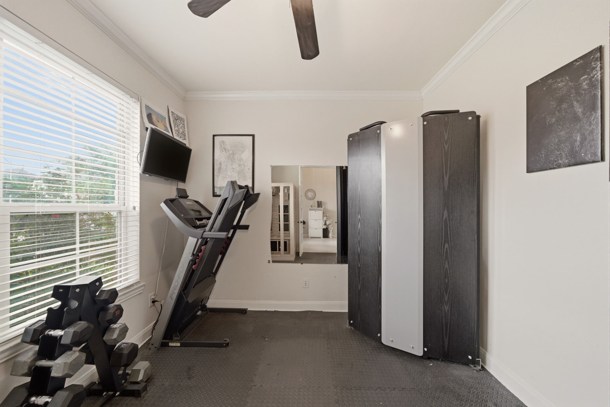 21807 Lozar Drive Spring, TX 77379 - Photo 12 of 20 a view of a room with gym equipment