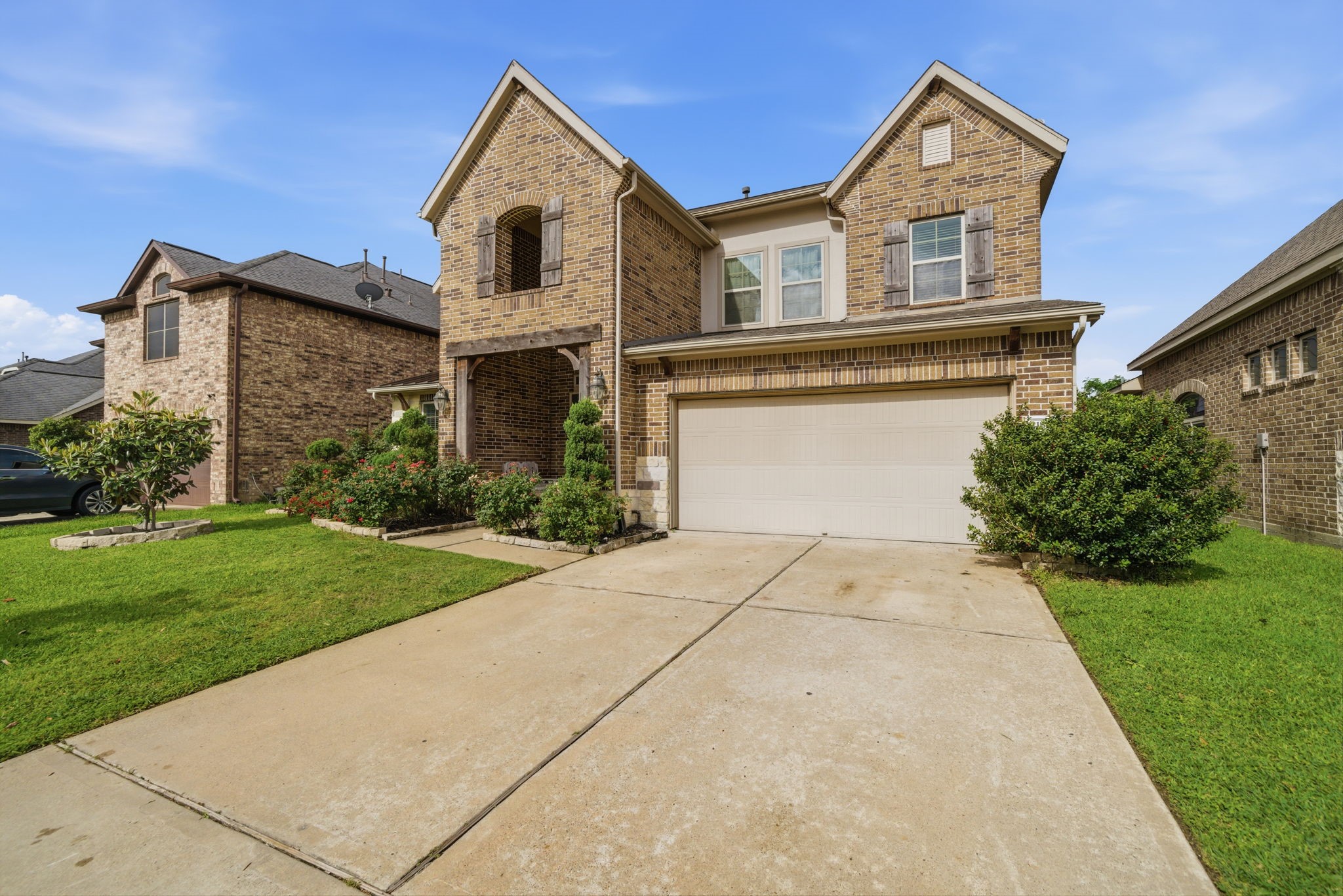 21807 Lozar Drive Spring, TX 77379 - Photo 2 of 20 front view of house with a yard