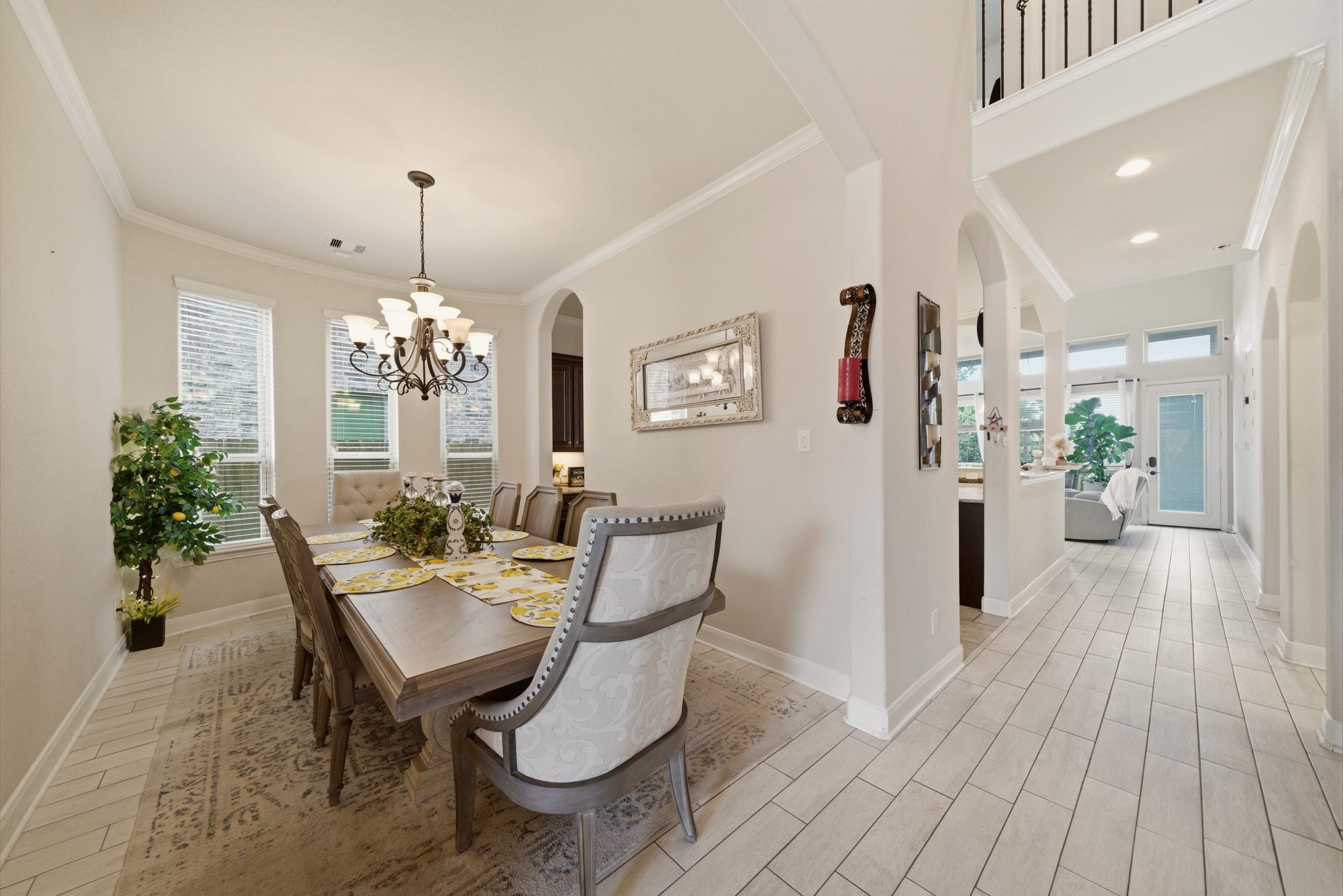 21807 Lozar Drive Spring, TX 77379 - Photo 5 of 20 a view of a dining room with furniture and wooden floor