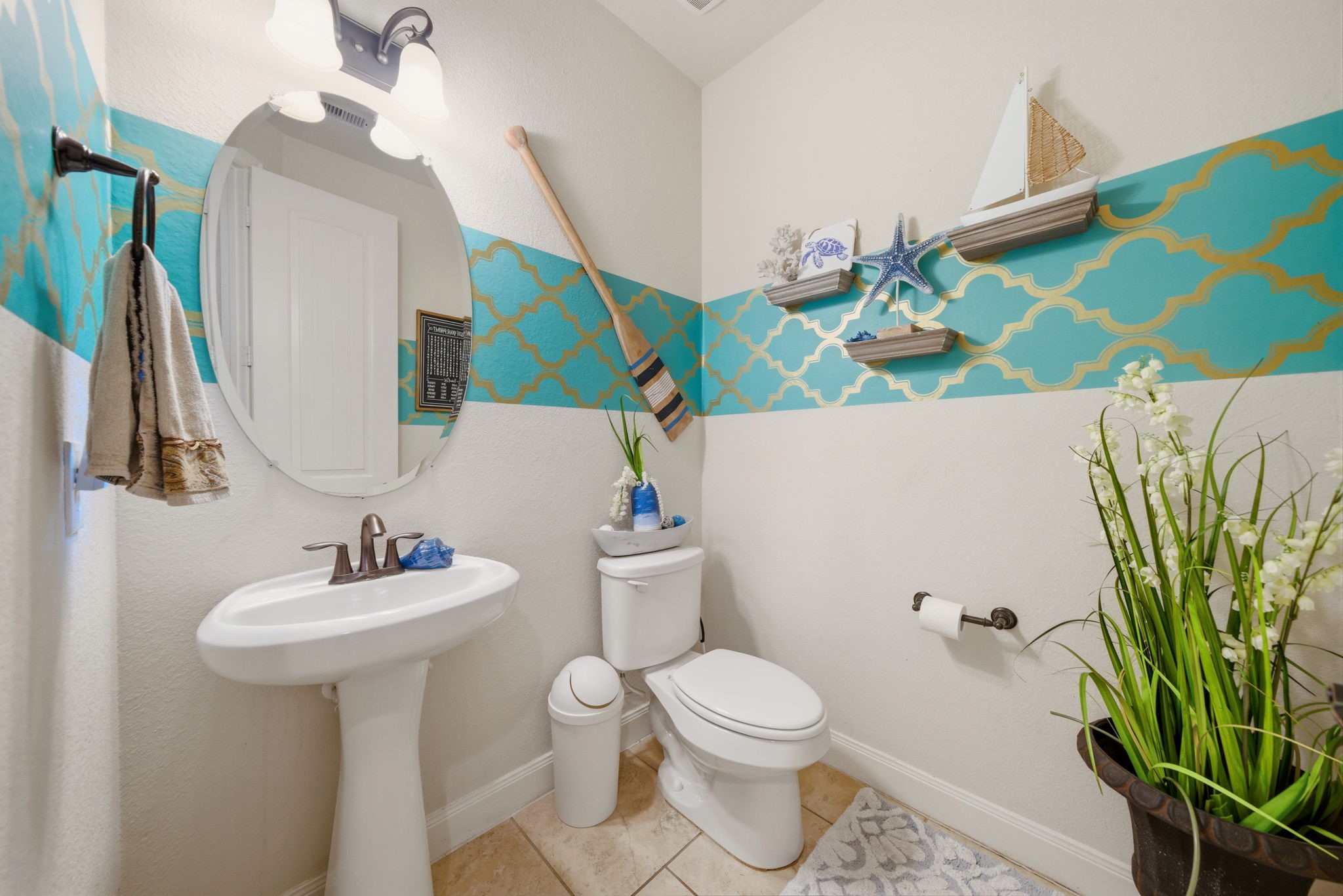 21807 Lozar Drive Spring, TX 77379 - Photo 8 of 20 a bathroom with a sink a mirror and toilet