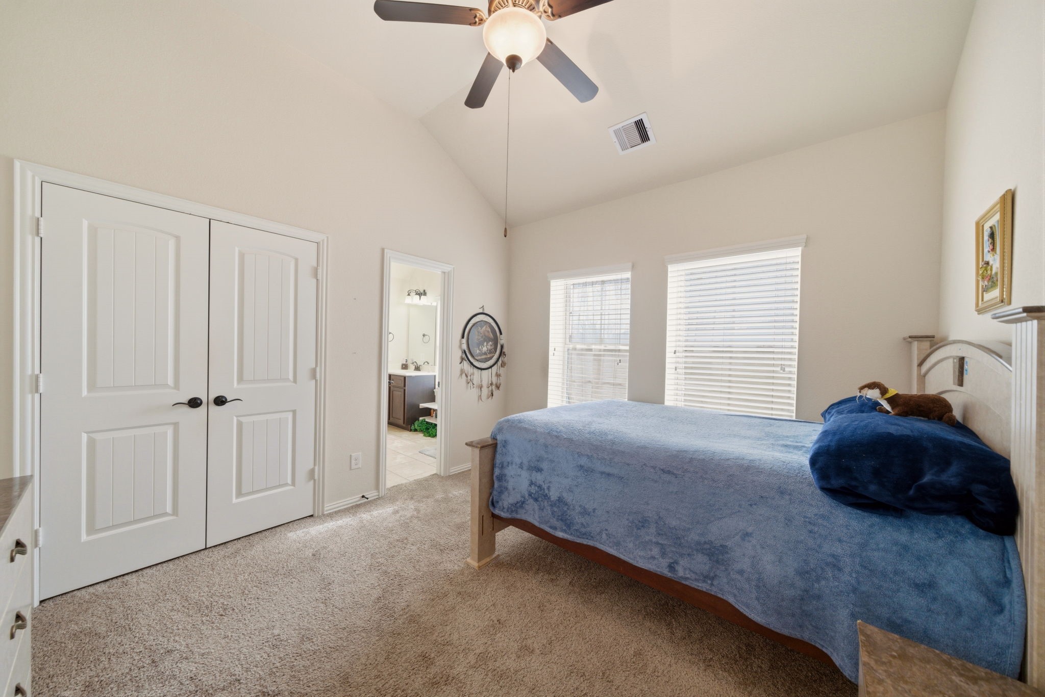 21807 Lozar Drive Spring, TX 77379 - Photo 10 of 20 a bedroom with a bed and a large window