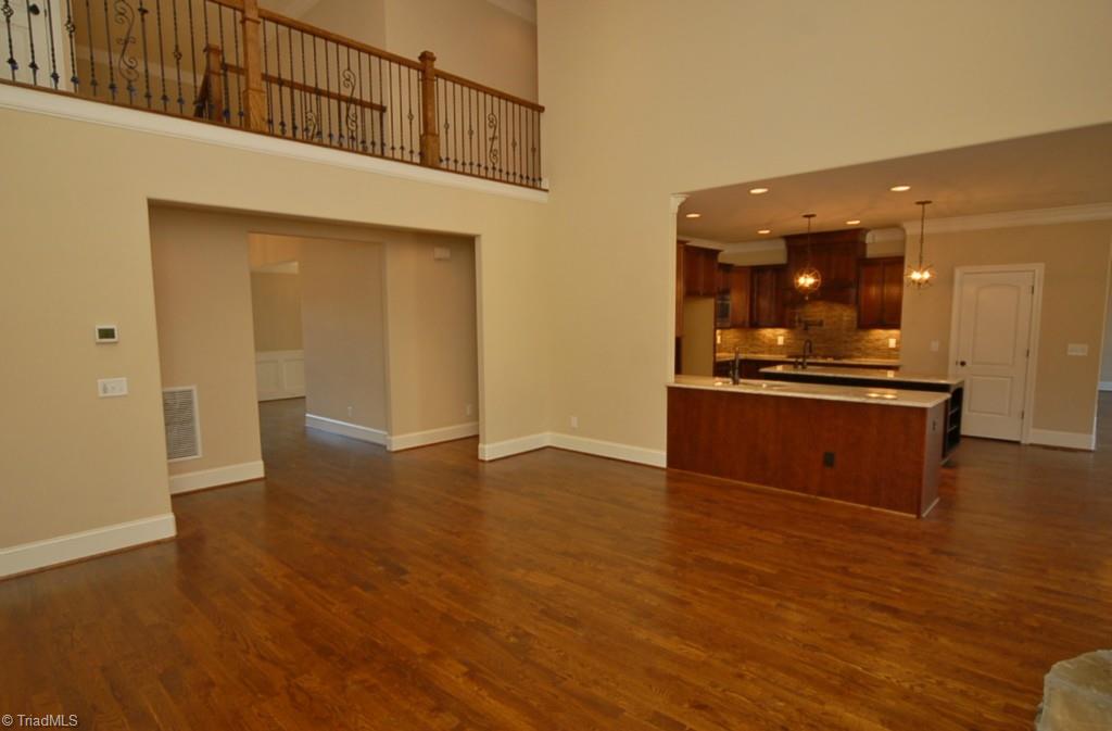7502 Hearthridge Court Oak Ridge, NC 27310 - Photo 8 of 30 A wonderful place to entertain! Custom molding work throughout.