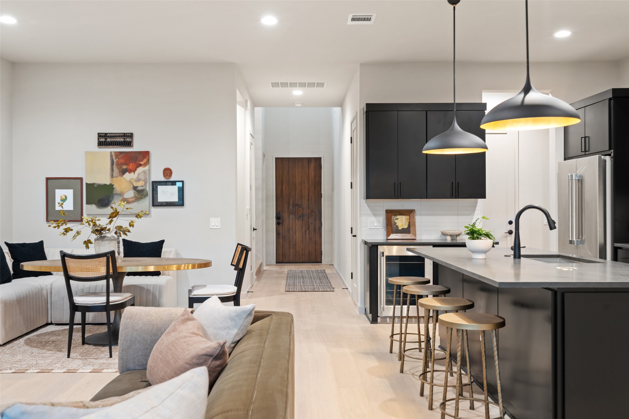 9803 Ribelin Ranch Court, Unit 6 Austin, TX 78750 - Photo 31 of 31 An open floorplan seamlessly connects the contemporary kitchen and dining area.