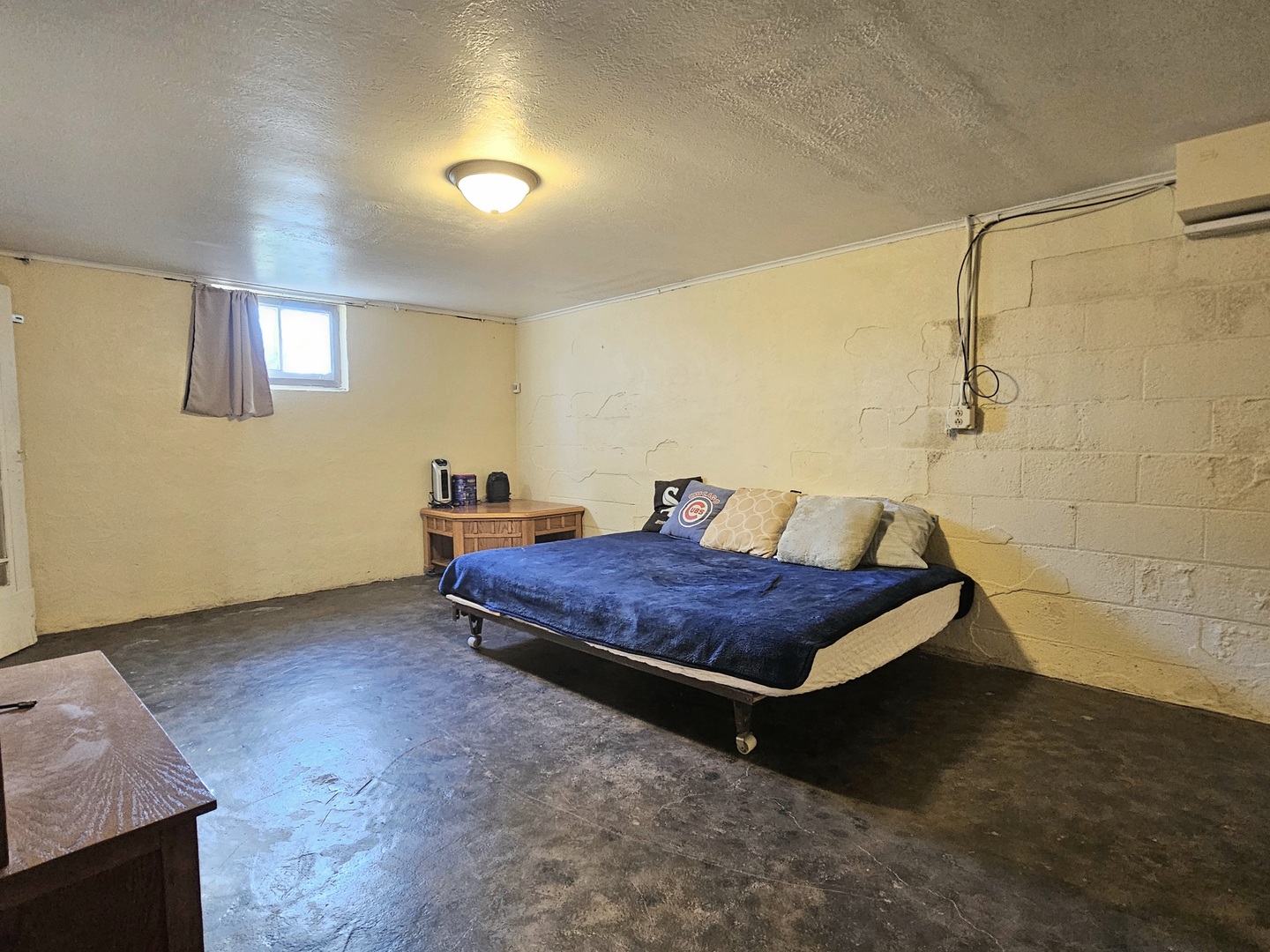 122 South Park Road Joliet, IL 60433 - Photo 15 of 19 a bedroom with a bed and a table