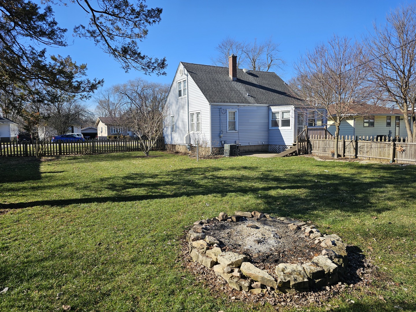 122 South Park Road Joliet, IL 60433 - Photo 17 of 19 a front view of a house with a yard