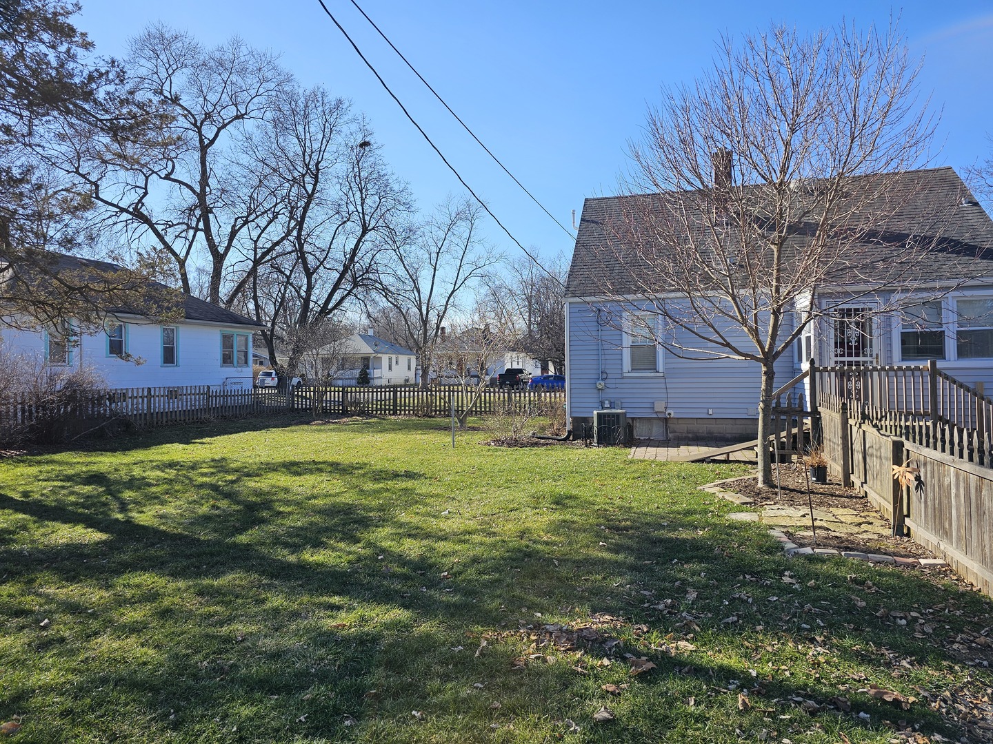 122 South Park Road Joliet, IL 60433 - Photo 18 of 19 a view of a house with a yard