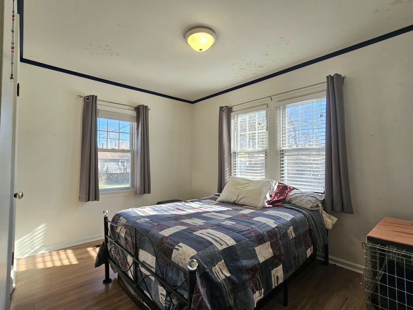 122 South Park Road Joliet, IL 60433 - Photo 10 of 19 a bedroom with a bed and a window