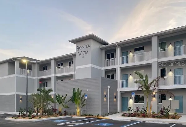 a front view of a building with street view