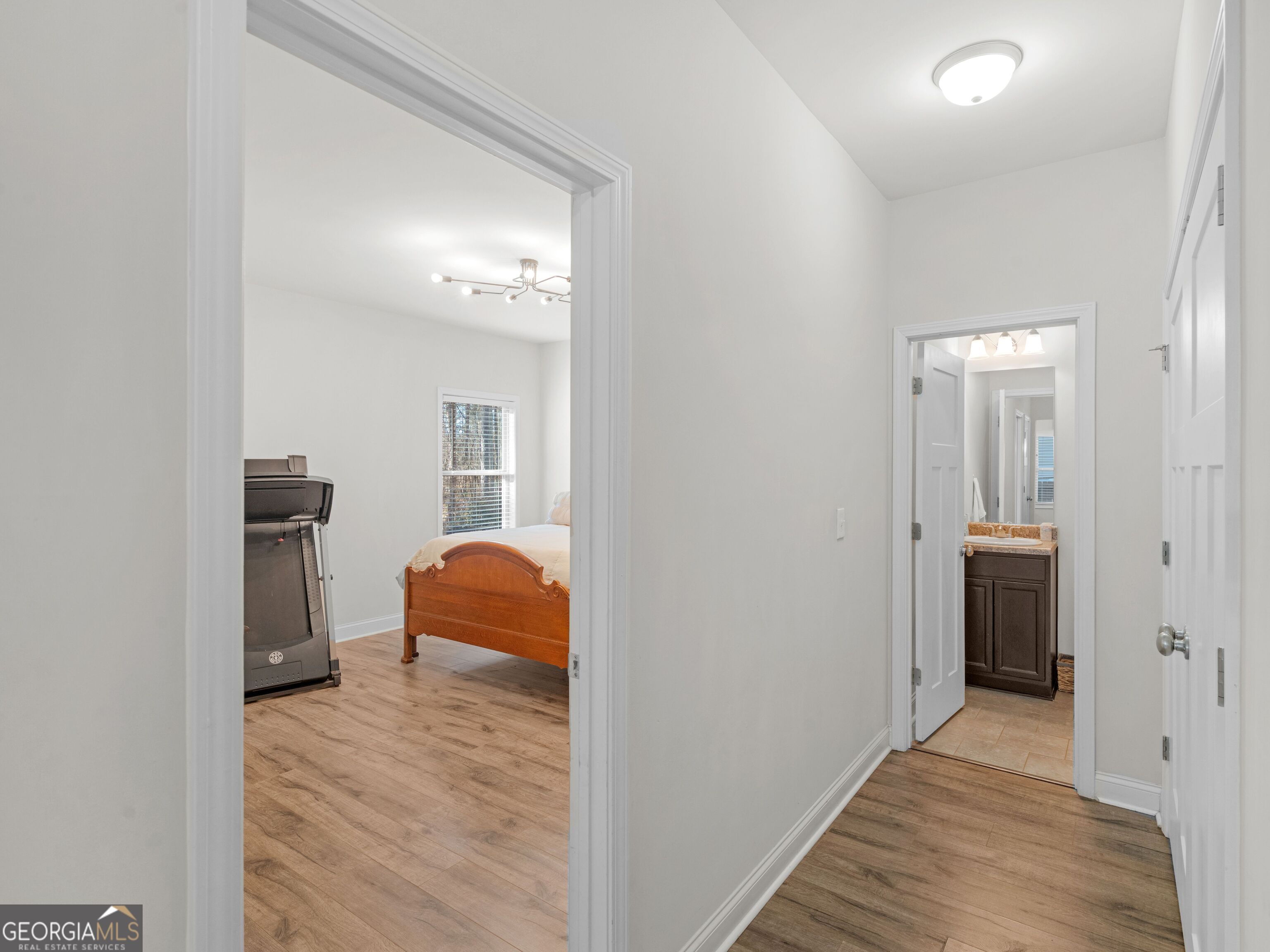 57 Partridge Court Monticello, GA 31064 - Photo 21 of 47 a bedroom with a bed and a view of bathroom