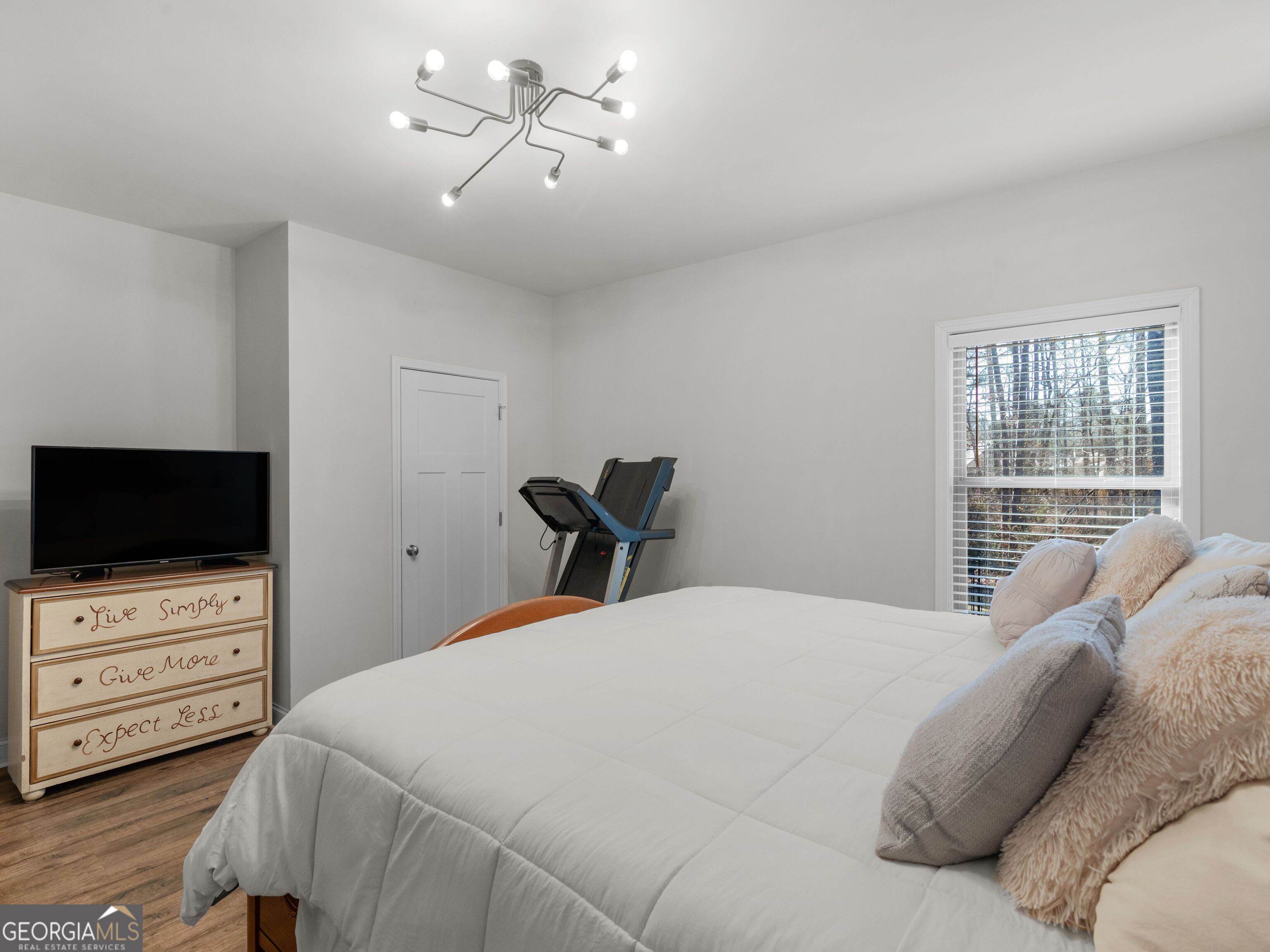 57 Partridge Court Monticello, GA 31064 - Photo 22 of 47 a bedroom with a bed and a flat screen tv