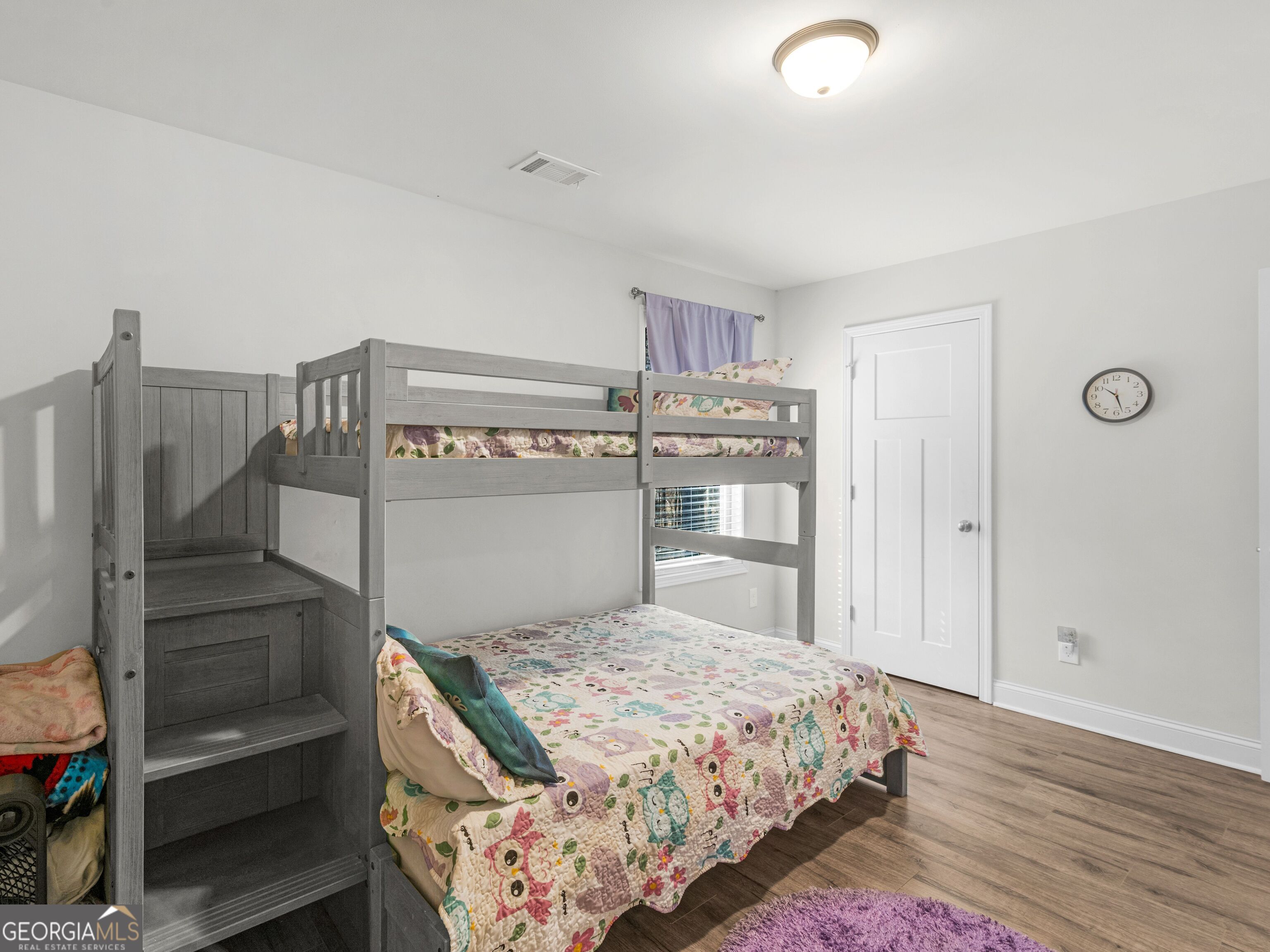 57 Partridge Court Monticello, GA 31064 - Photo 32 of 47 a bedroom with a bed and a view of kitchen