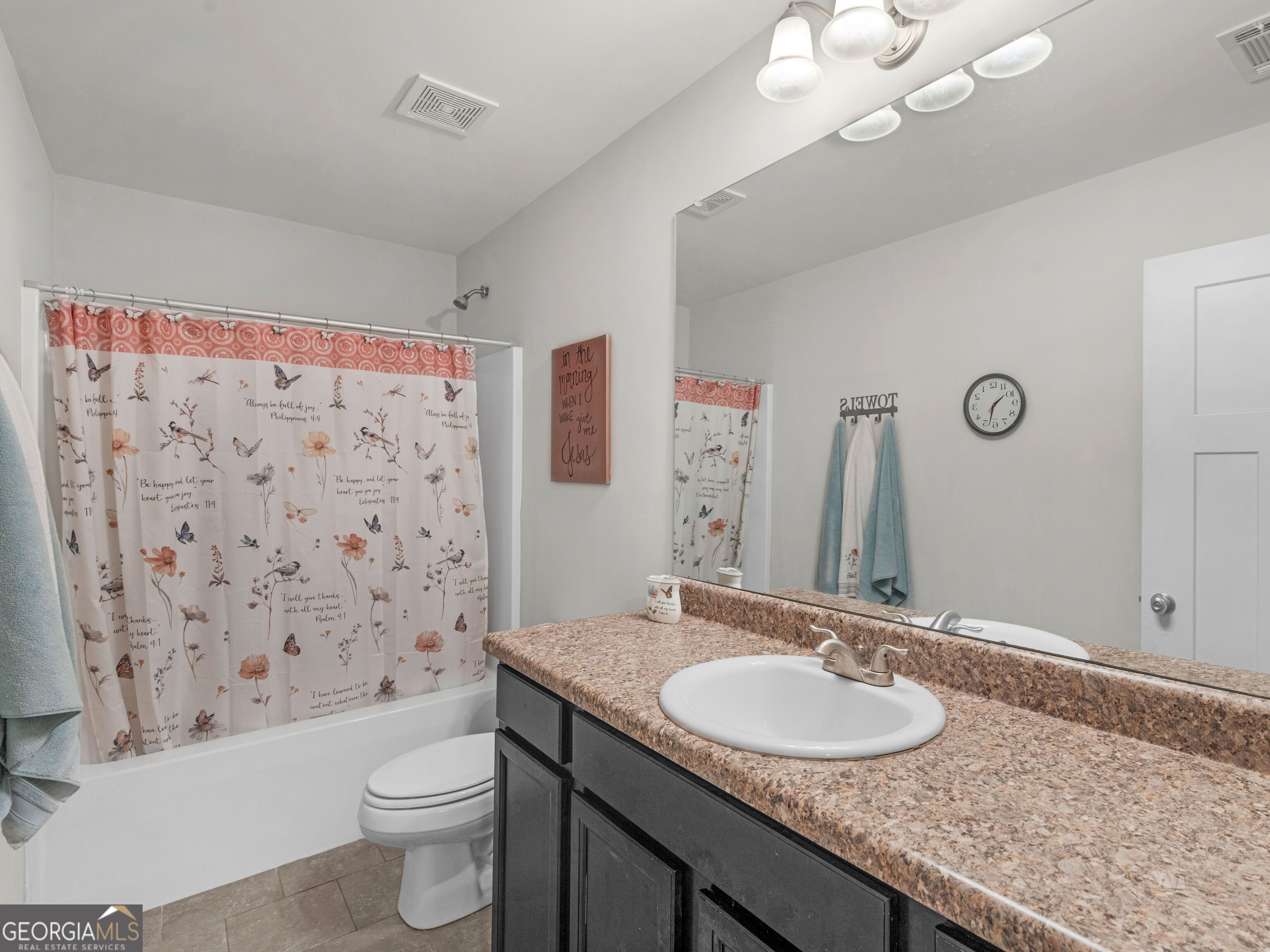 57 Partridge Court Monticello, GA 31064 - Photo 33 of 47 a bathroom with a granite countertop sink a toilet and a mirror