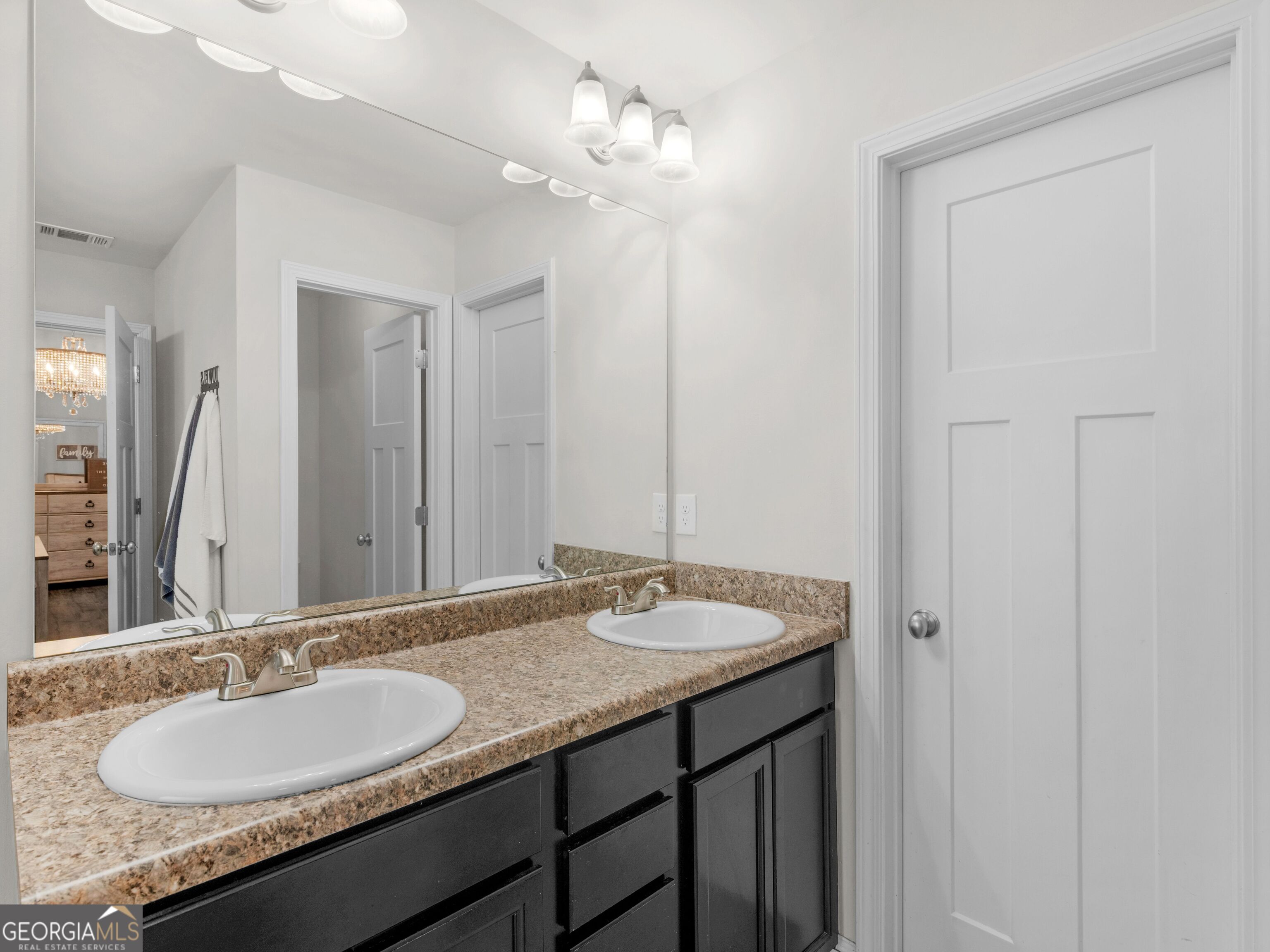 57 Partridge Court Monticello, GA 31064 - Photo 43 of 47 a bathroom with a granite countertop sink and a mirror
