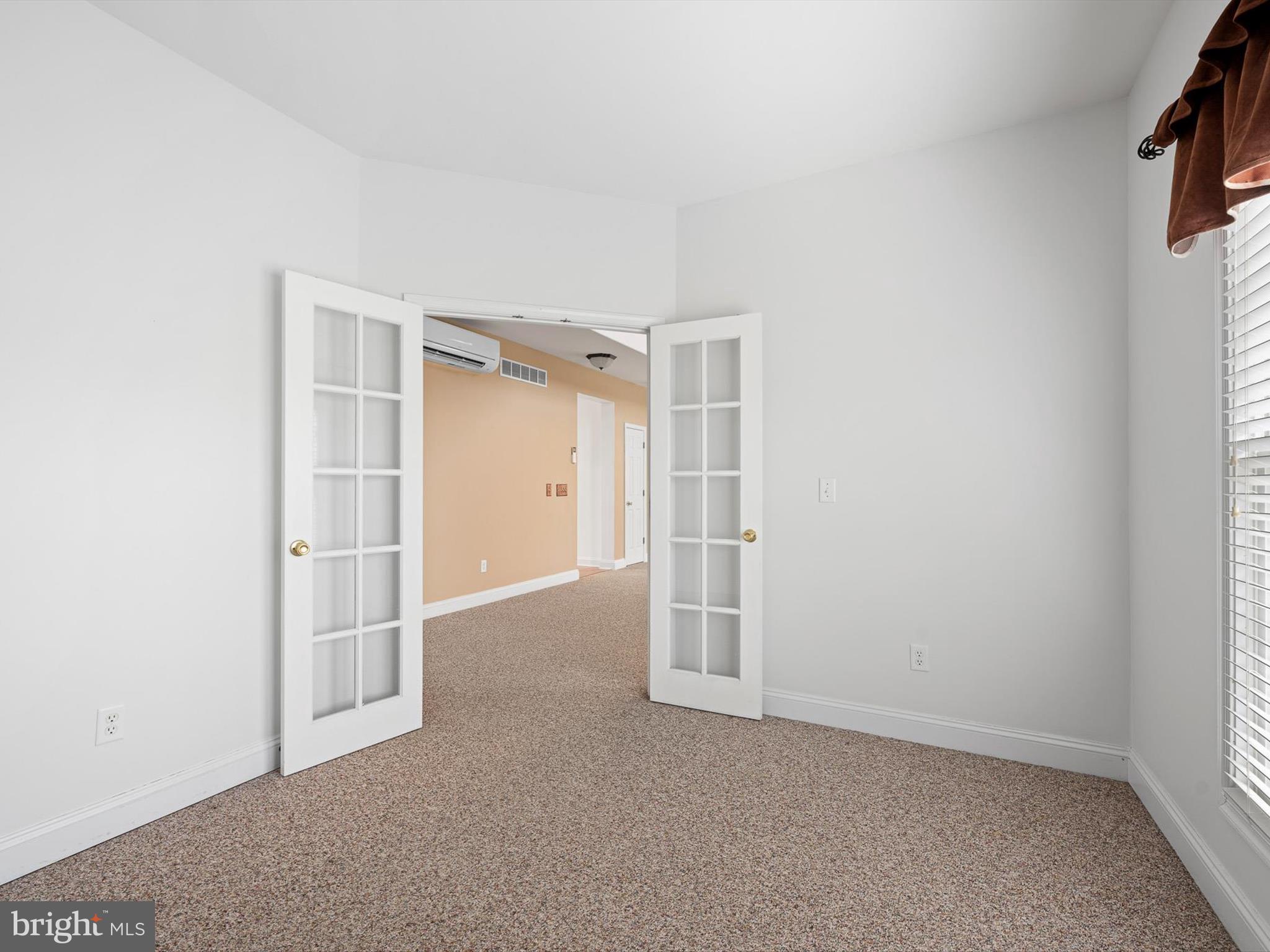 109 Chestnut Ridge Drive Magnolia, DE 19962 - Photo 17 of 44 an empty room with windows