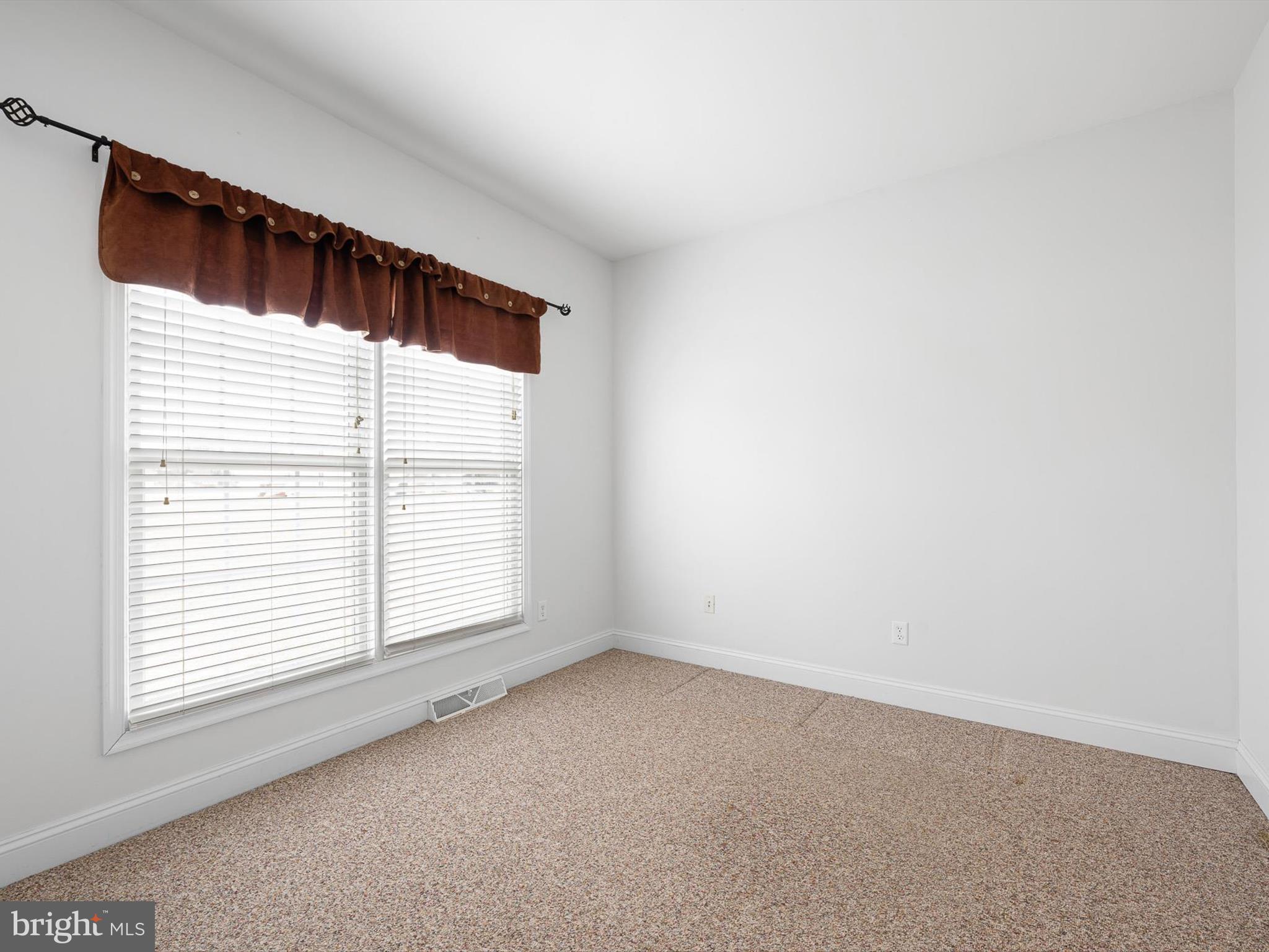 109 Chestnut Ridge Drive Magnolia, DE 19962 - Photo 18 of 44 an empty room with a window