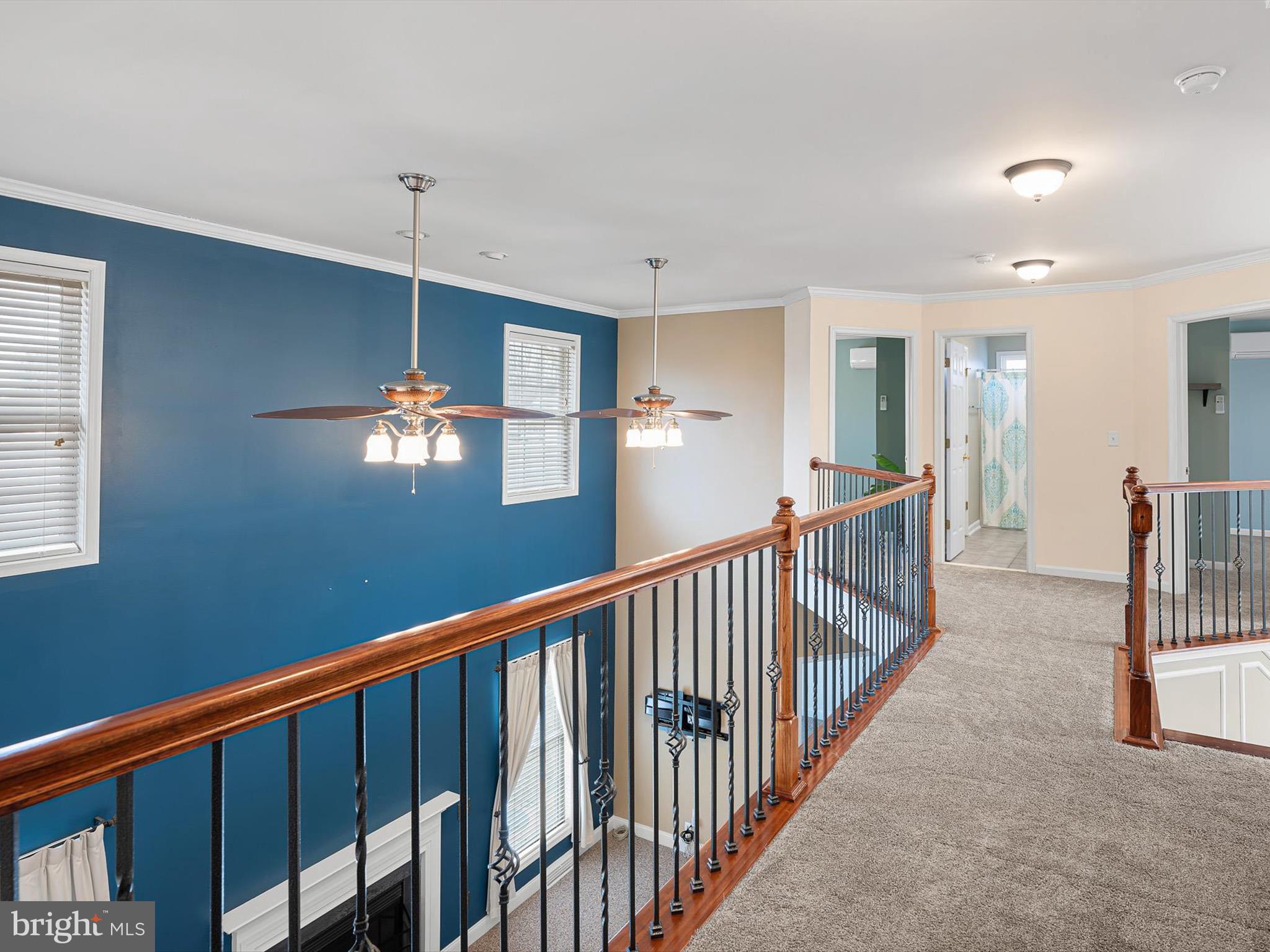 109 Chestnut Ridge Drive Magnolia, DE 19962 - Photo 21 of 44 a view of a hallway with a chandelier