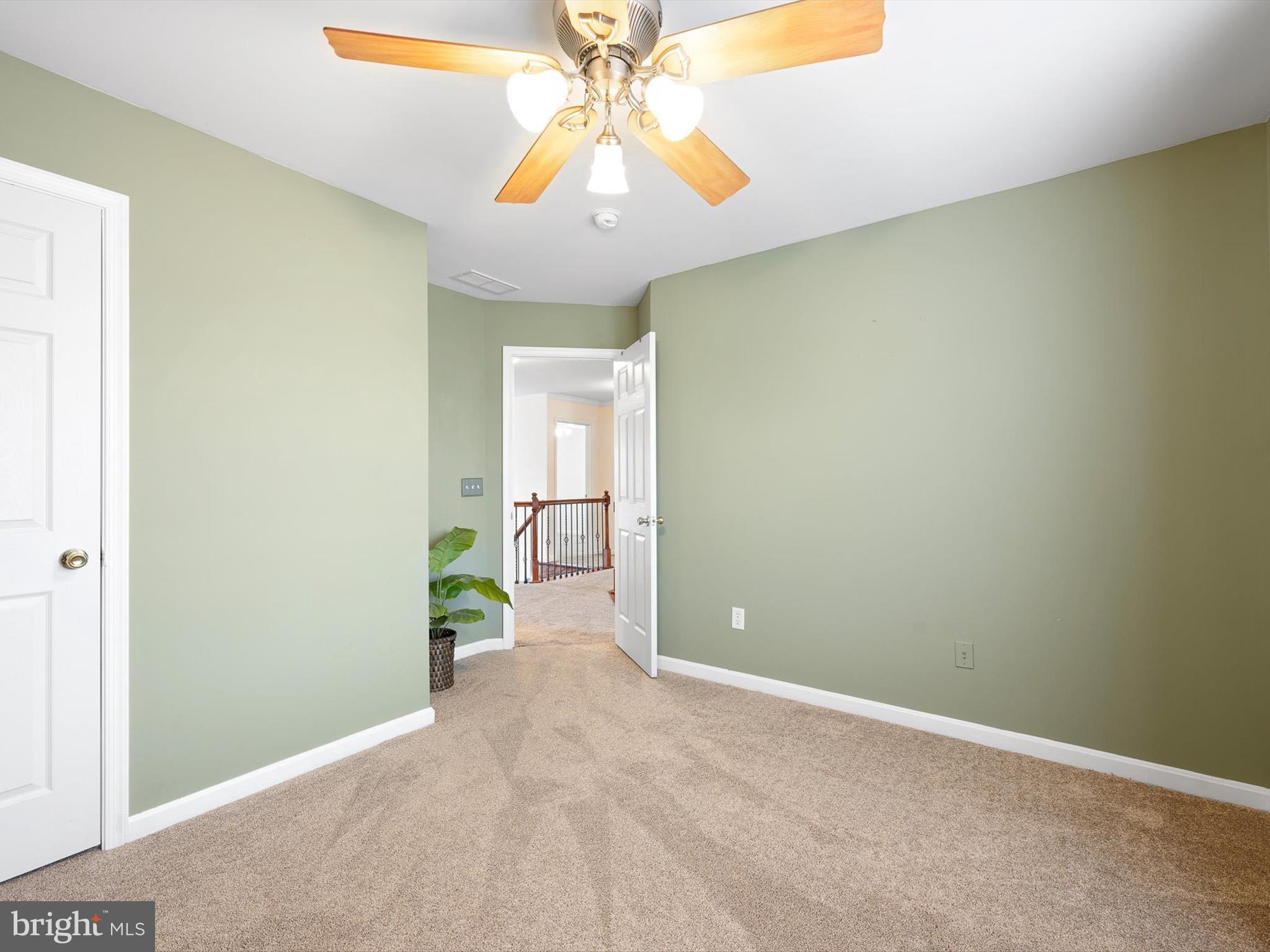 109 Chestnut Ridge Drive Magnolia, DE 19962 - Photo 29 of 44 an empty room with closet and a chandelier fan