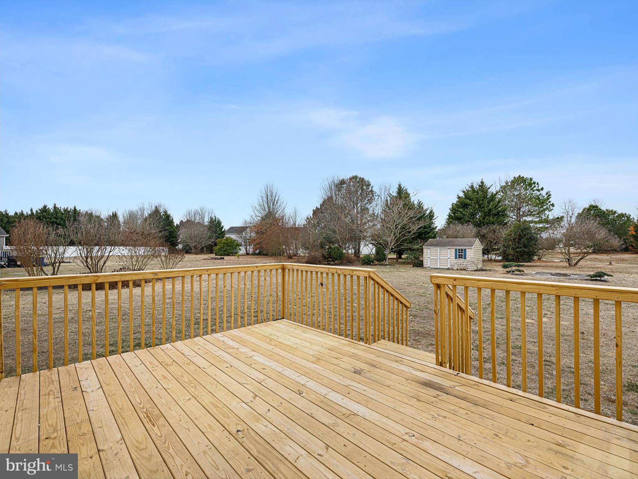 109 Chestnut Ridge Drive Magnolia, DE 19962 - Photo 36 of 44 a view of balcony with wooden floor and fence