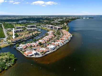 a view of a lake with a city