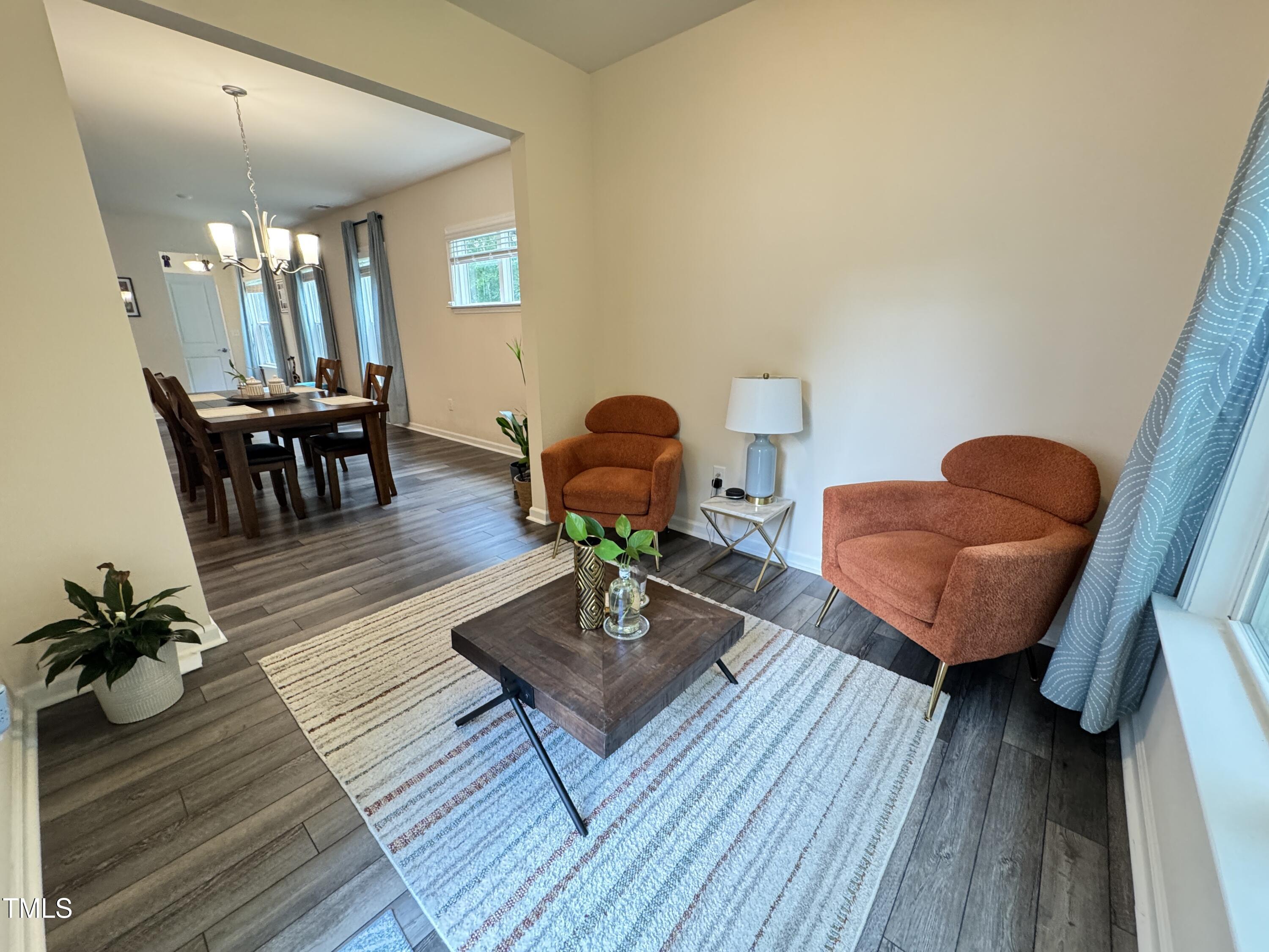 422 Notre Dame Drive Durham, NC 27713 - Photo 11 of 26 a living room with furniture and wooden floor