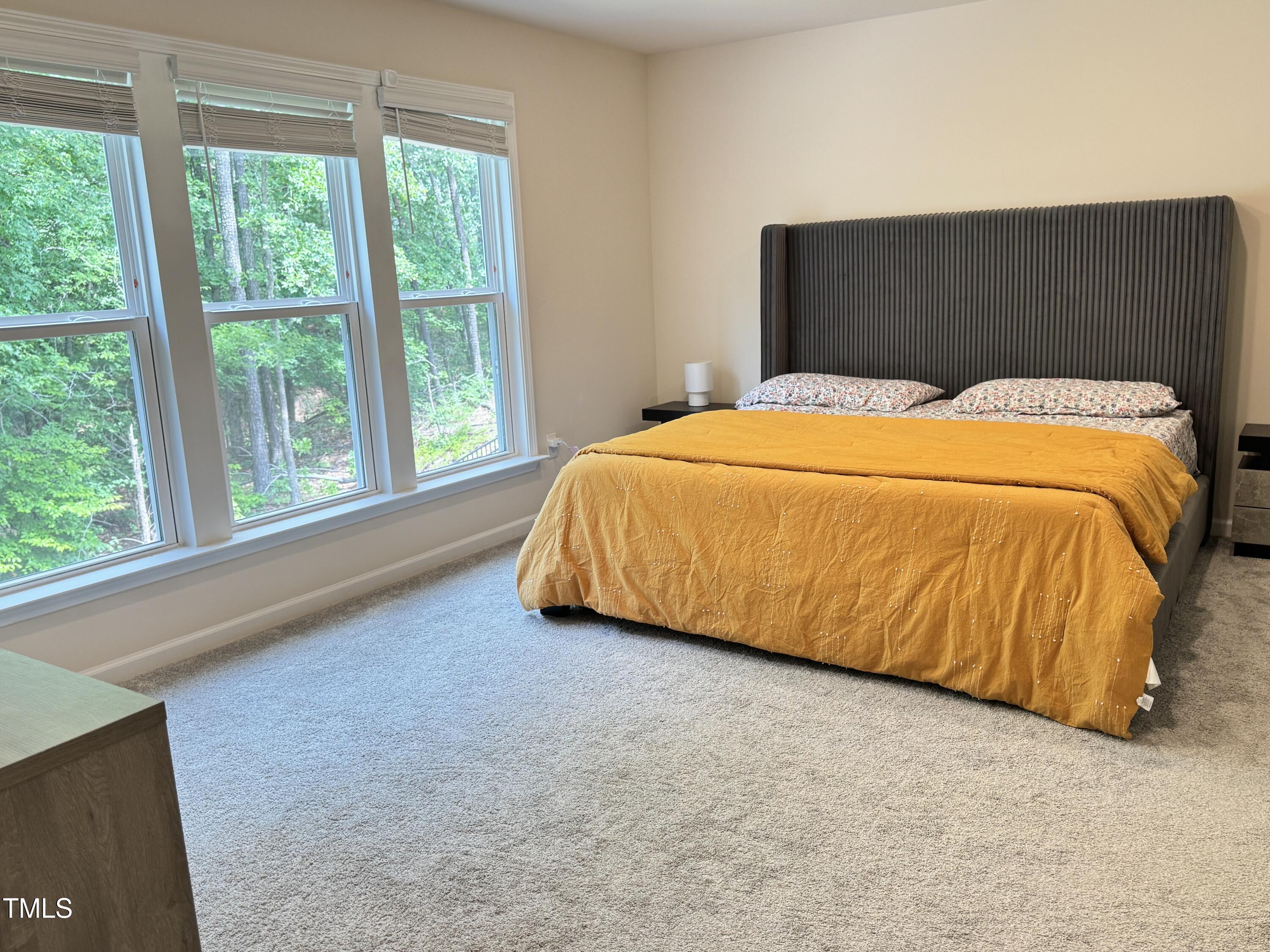 422 Notre Dame Drive Durham, NC 27713 - Photo 13 of 26 a bedroom with a bed and window