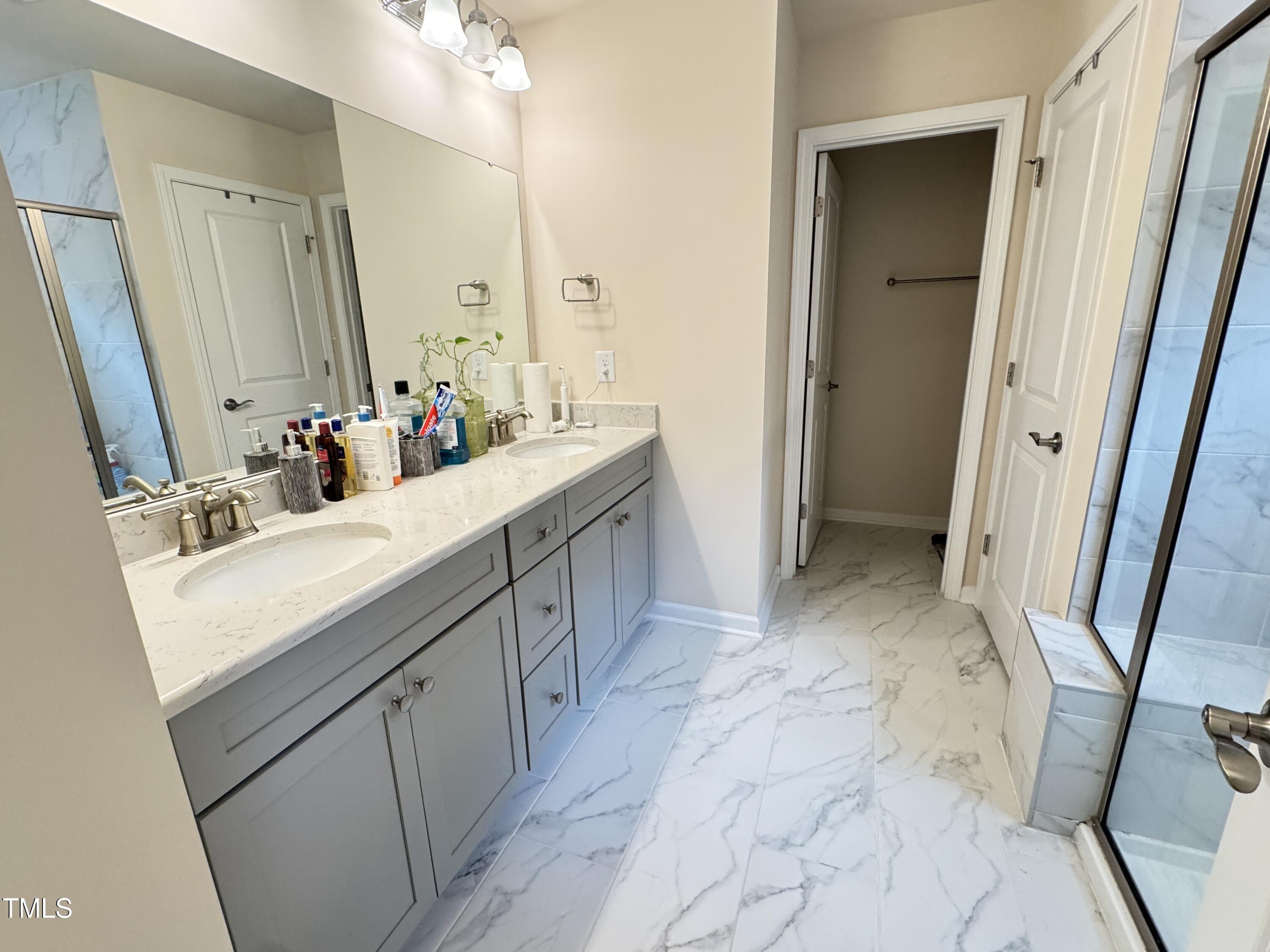 422 Notre Dame Drive Durham, NC 27713 - Photo 15 of 26 a bathroom with a sink vanity and a mirror