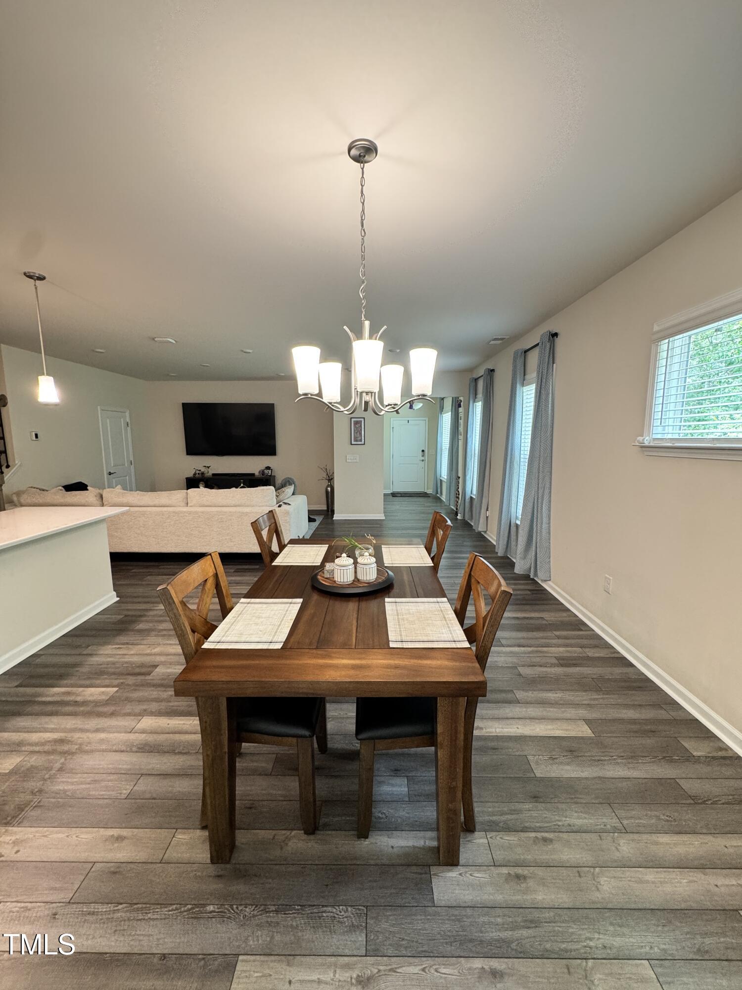 422 Notre Dame Drive Durham, NC 27713 - Photo 5 of 26 a view of a dining room with furniture and wooden floor