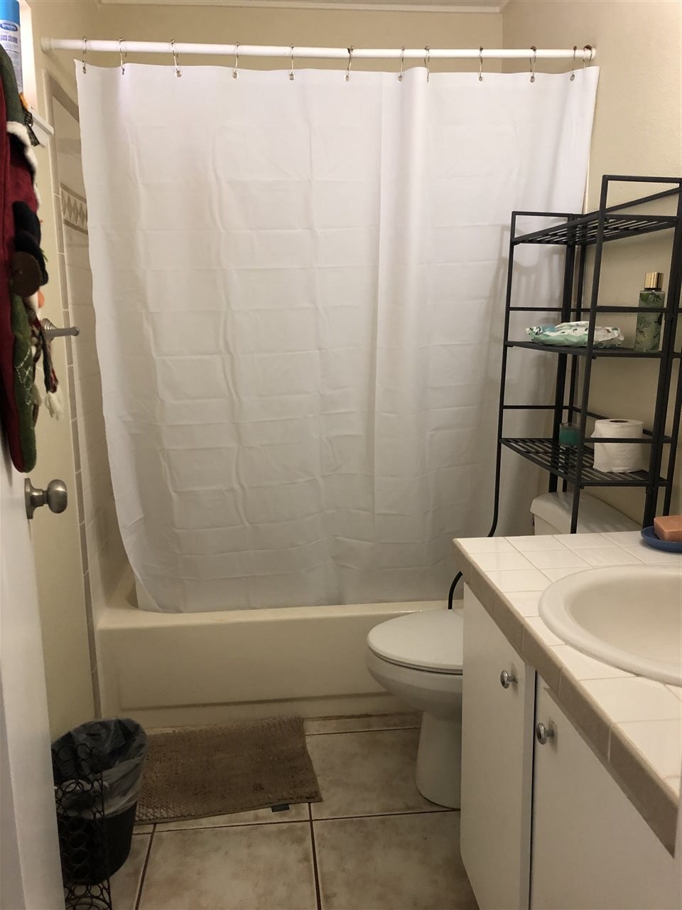 3740 Lower Honoapiilani Road, Unit B103 Lahaina, HI 96761 - Photo 11 of 16 a bathroom with a sink a toilet and shower