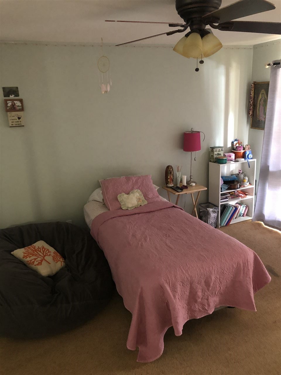 3740 Lower Honoapiilani Road, Unit B103 Lahaina, HI 96761 - Photo 7 of 16 a bedroom with a bed and a table
