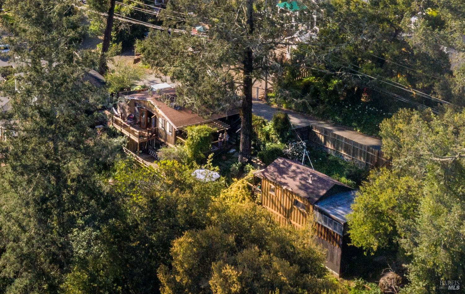 631-633 Sunnyside Road St. Helena, CA 94574 - Photo 2 of 18 an aerial view of residential house with outdoor space and trees all around