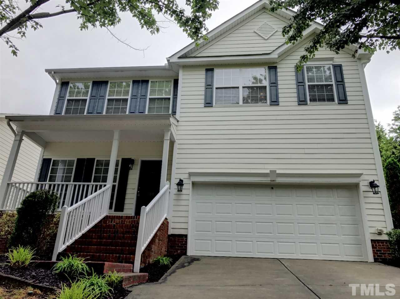 208 Rapp Lane Apex, NC 27502 - Photo 1 of 16 a front view of a house with stairs