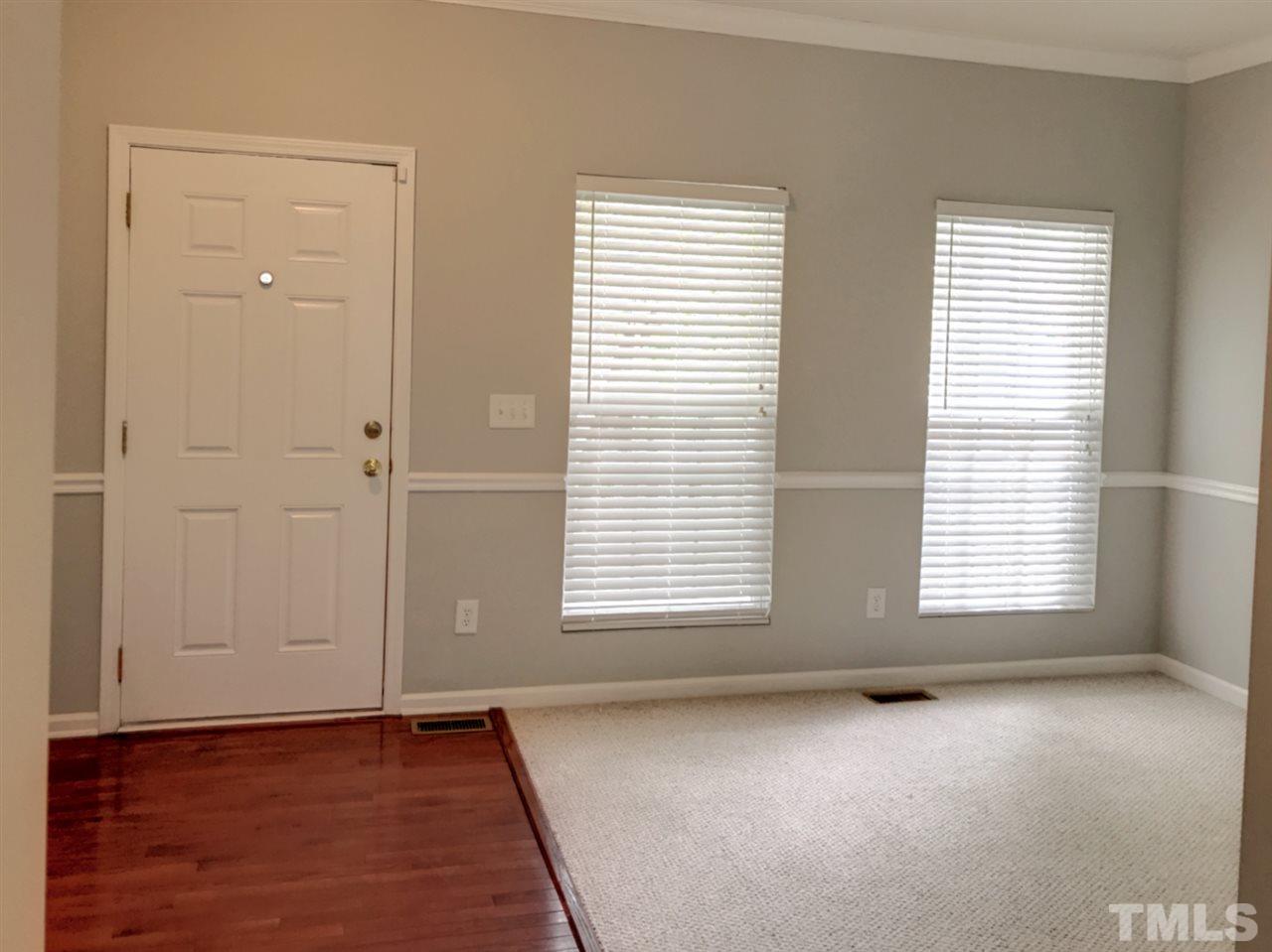208 Rapp Lane Apex, NC 27502 - Photo 5 of 16 an empty room with a window