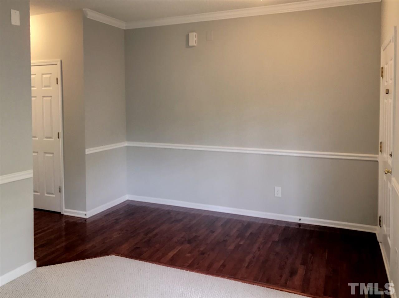 208 Rapp Lane Apex, NC 27502 - Photo 6 of 16 a view of an empty walk in closet