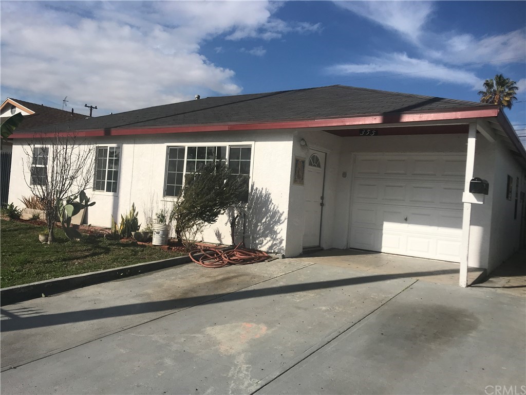 355 East 181st Street Carson, CA 90746 - Photo 1 of 1 a view of a car garage door