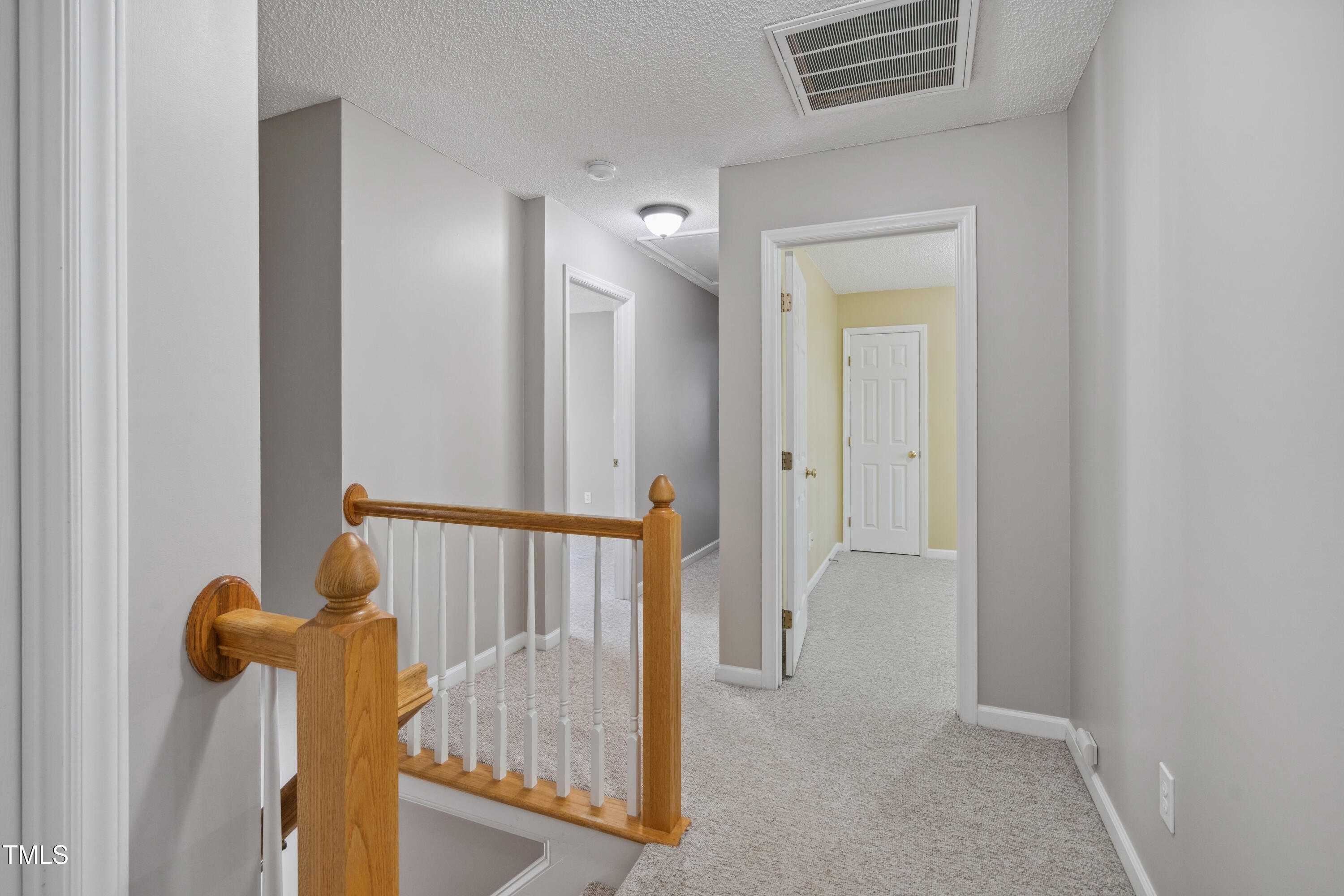 7019 Bellard Court Raleigh, NC 27617 - Photo 17 of 31 Upstairs Hallway