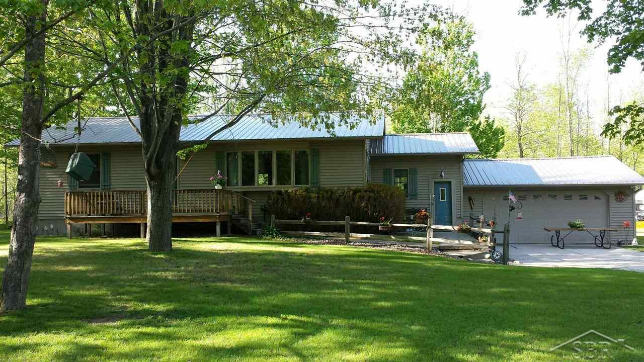 1150 West Whitefeather Road Pinconning, MI 48650 - Photo 1 of 12