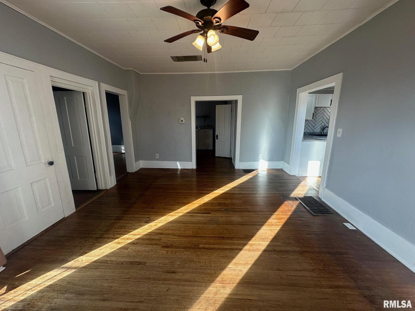 323 Lincoln Street Miles, IA 52064 - Photo 3 of 34 a view of gallery with wooden floor