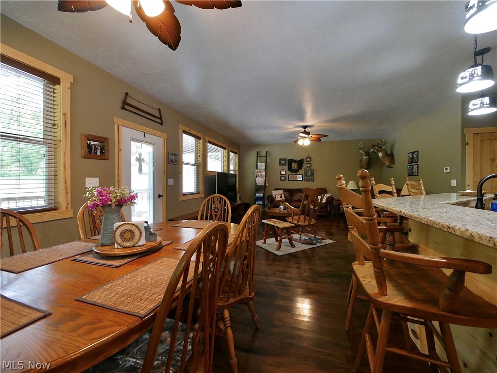 75450 Fair Road Freeport, OH 43973 - Photo 12 of 45 Dining room featuring ceiling fan and dark wood-type flooring