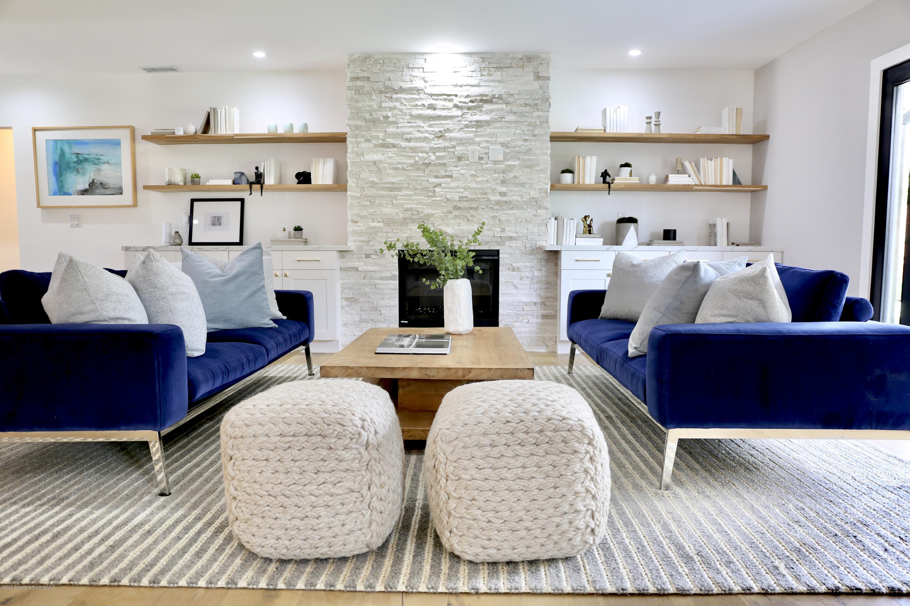 3665 Thorndale Road Pasadena, CA 91107 - Photo 11 of 45 a living room with furniture and a couch